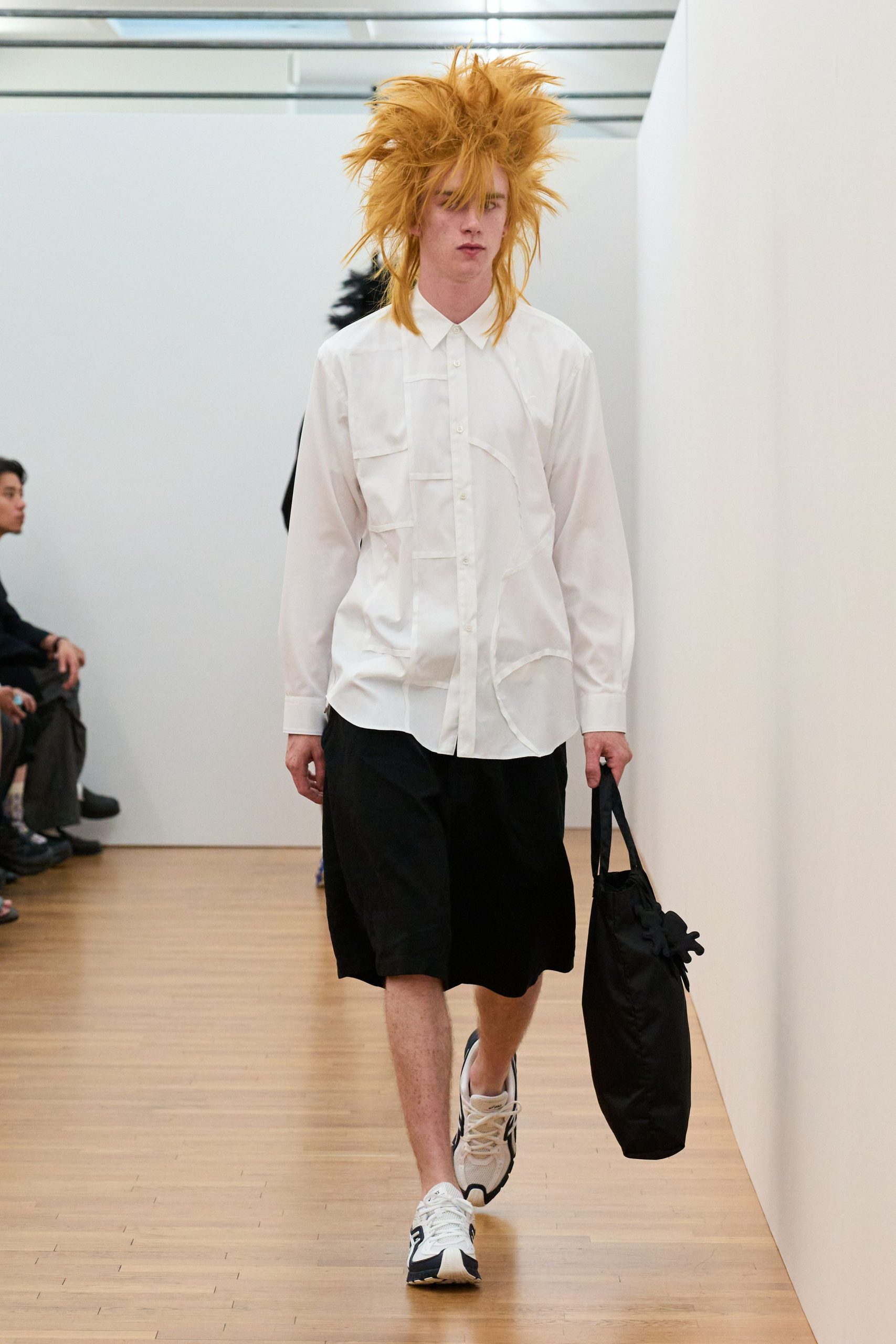 white shirt black shorts
