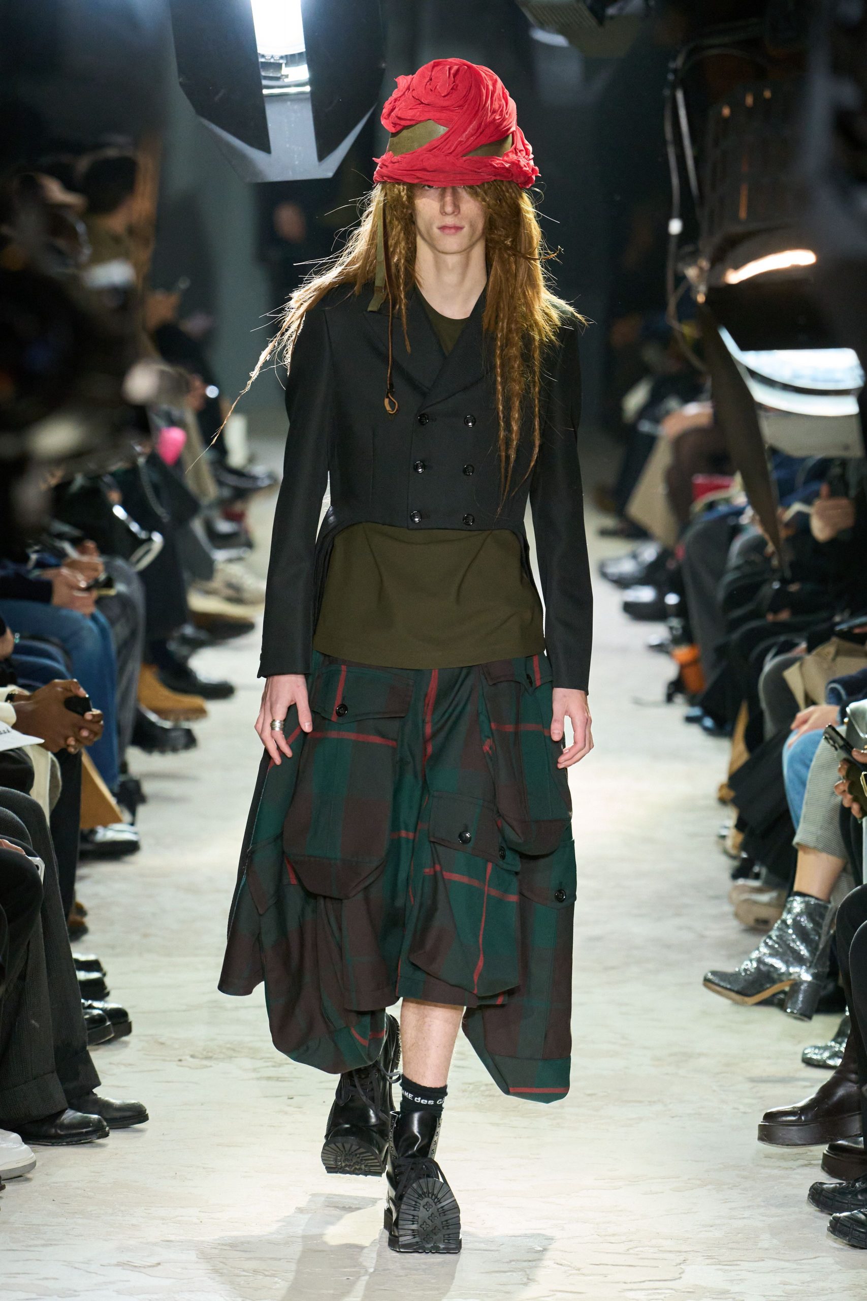 black jacket green top multi skirt