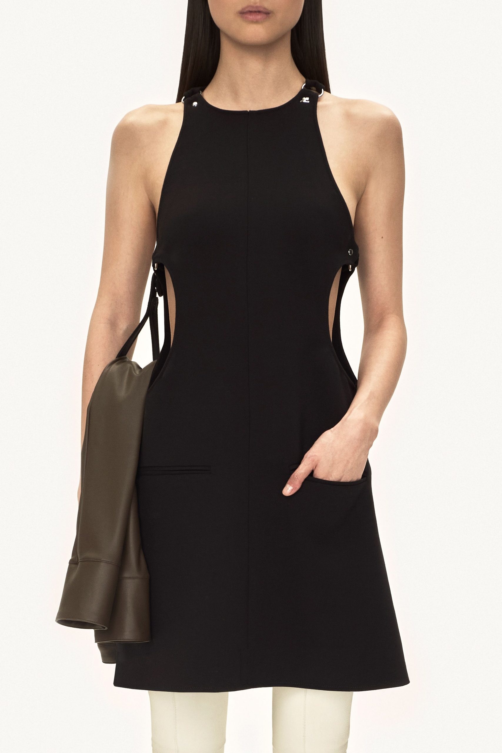 black neoprene cutout dress with brown leather jacket
