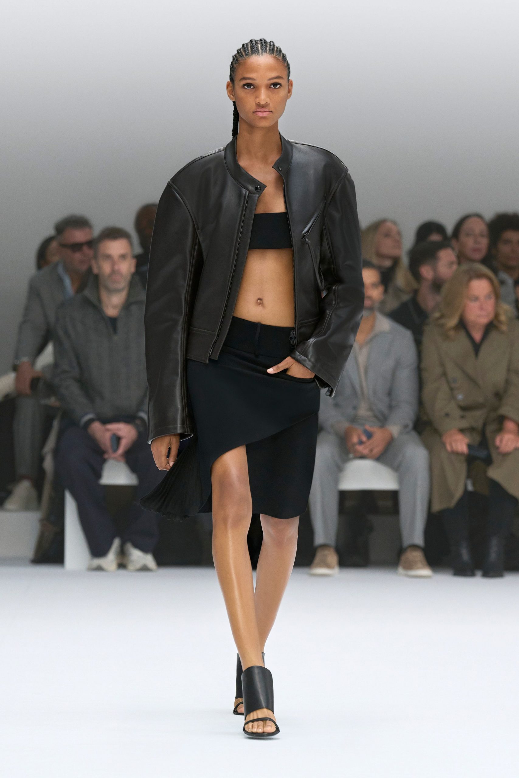 black leather jacket with fitted top and skirt