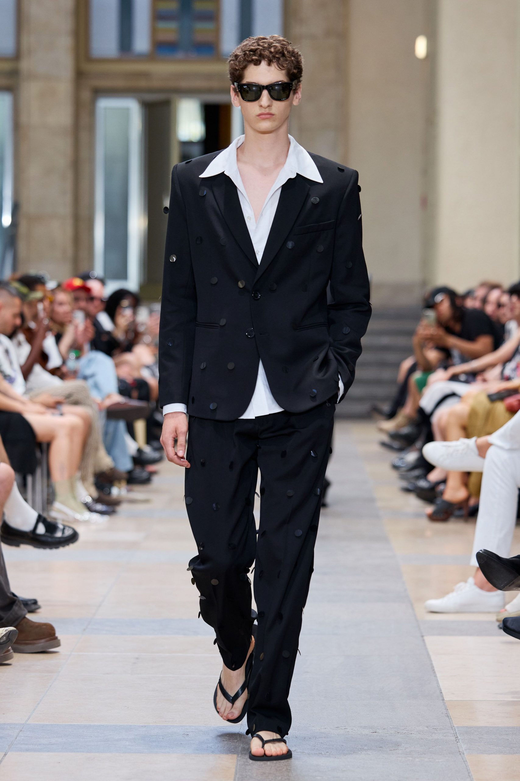 black tailored suit with white shirt