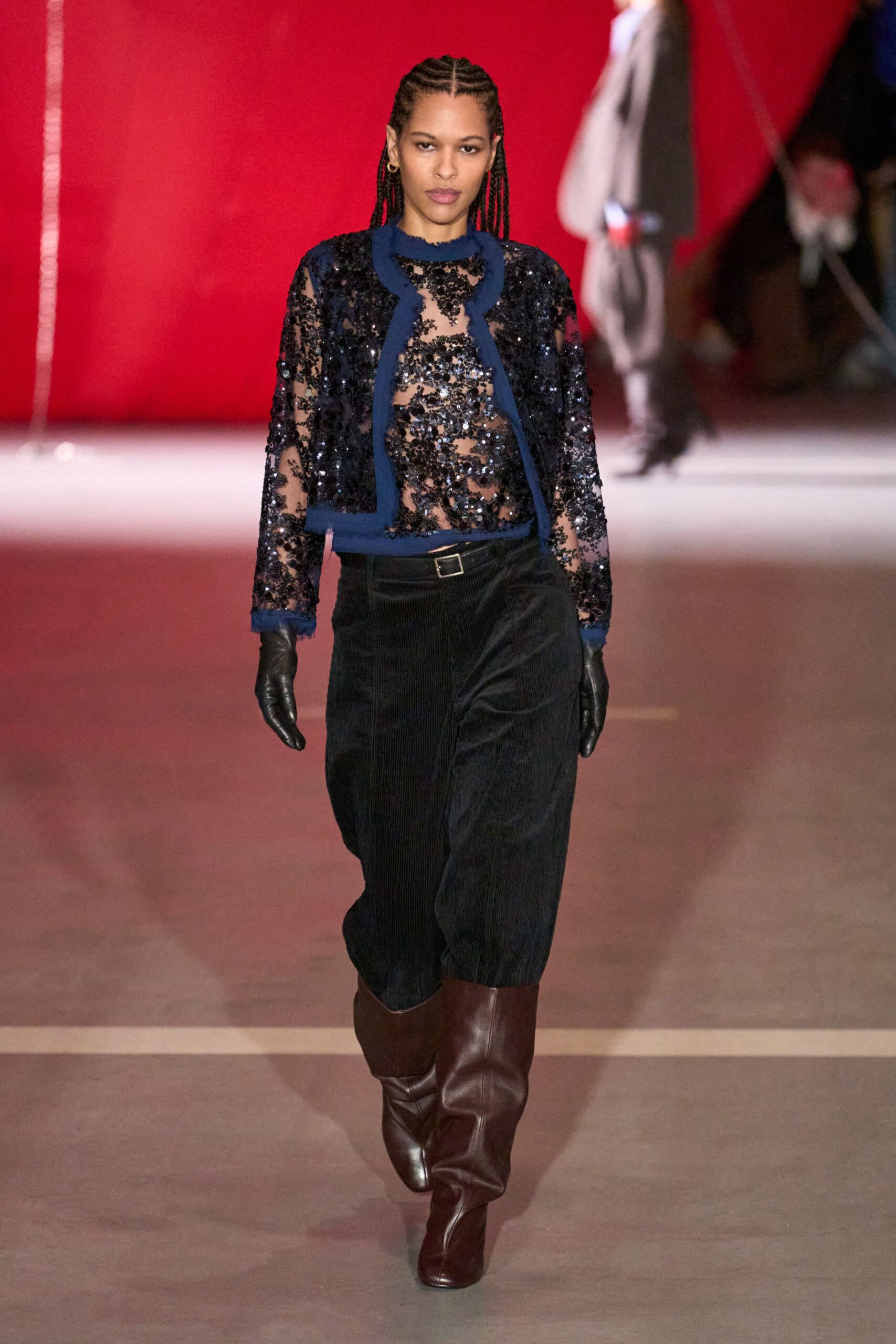 black sequined jacket with relaxed pants