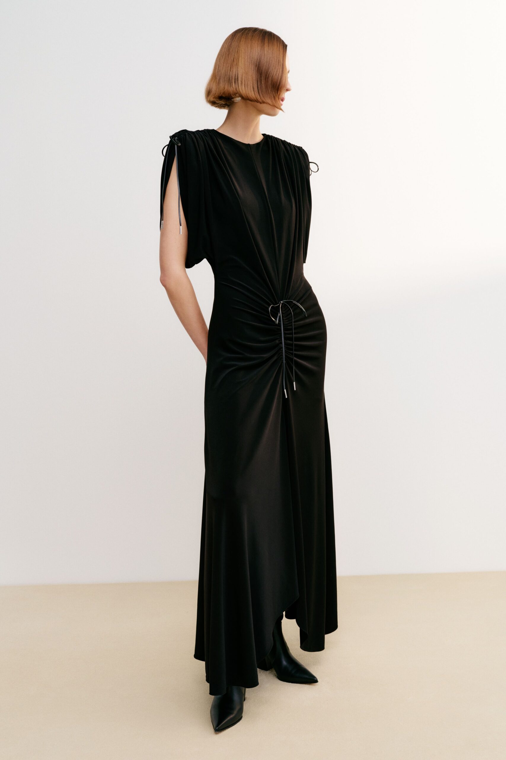 black silk sleeveless high-neck fitted ruched draped gown