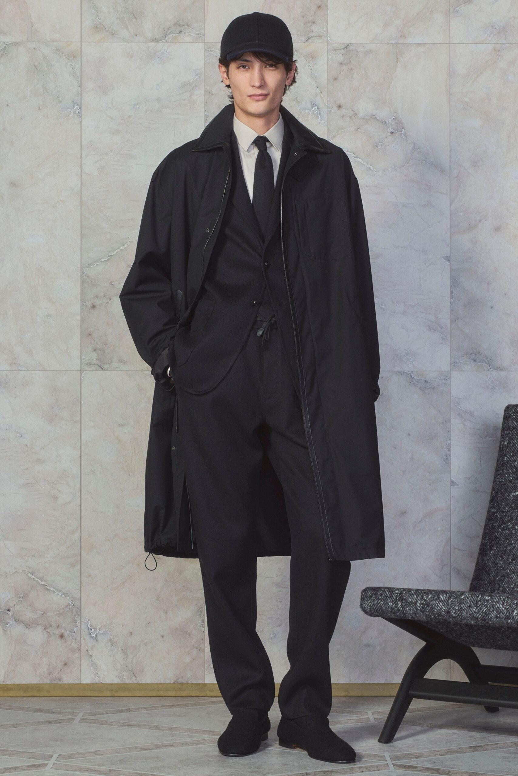 black coat and suit ensemble