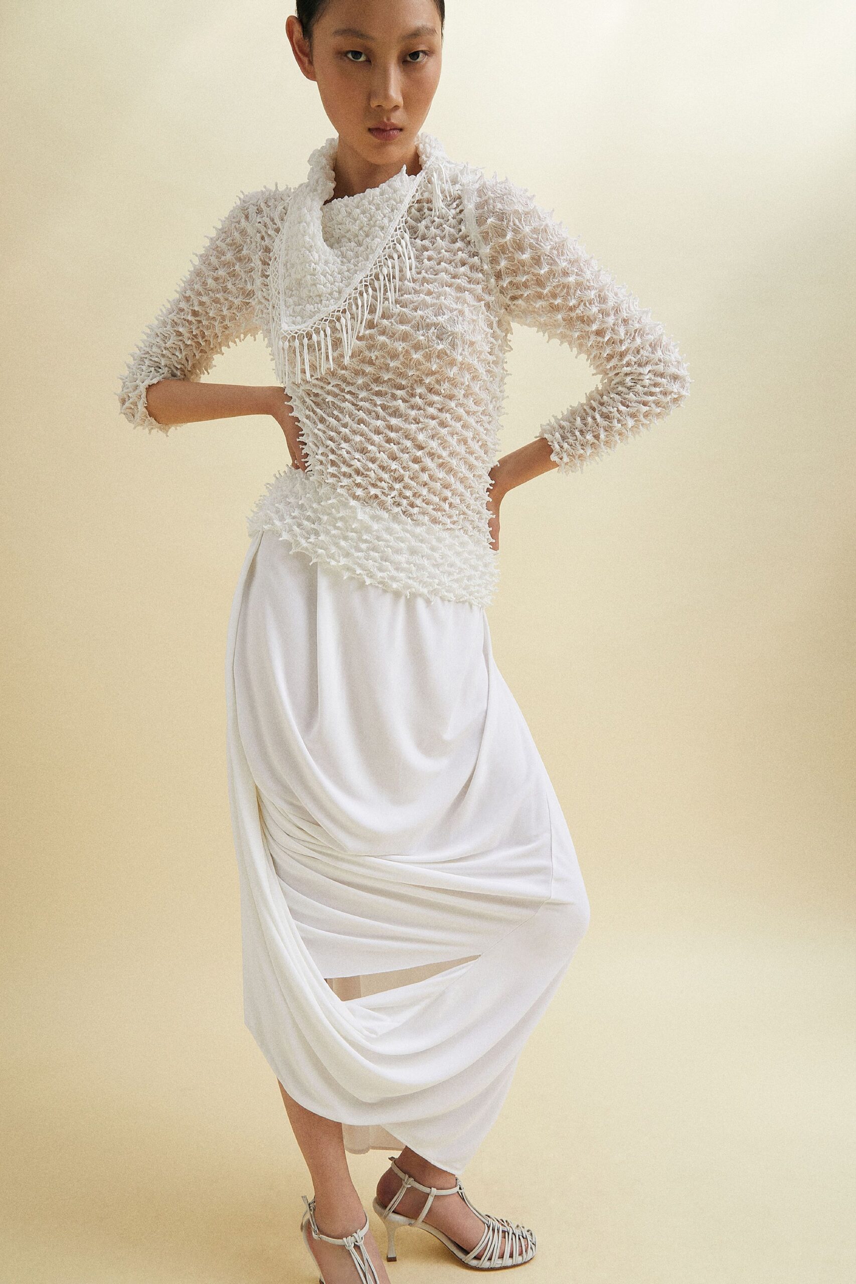 white cotton long-sleeve high-neck fitted ruffled textured top