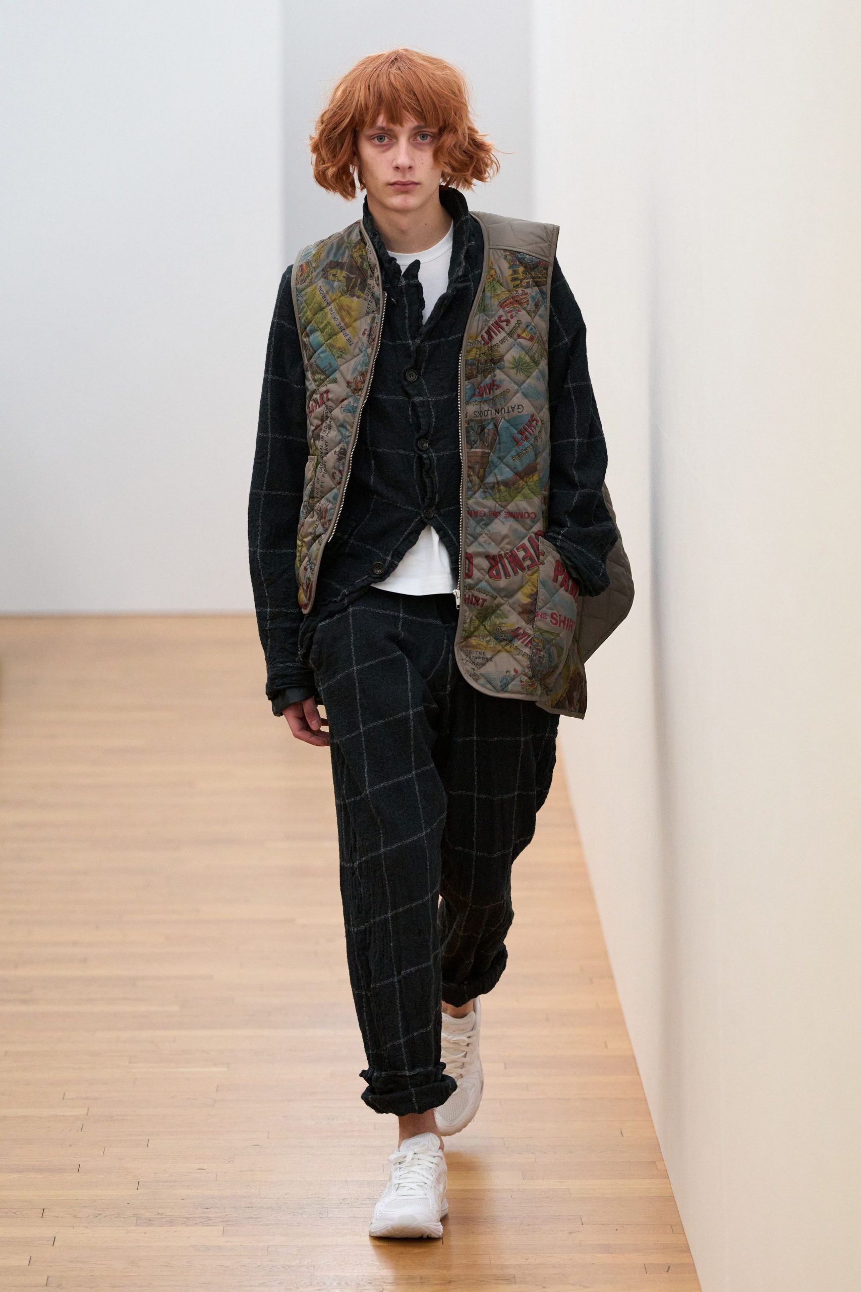 gray quilted vest with checked pants
