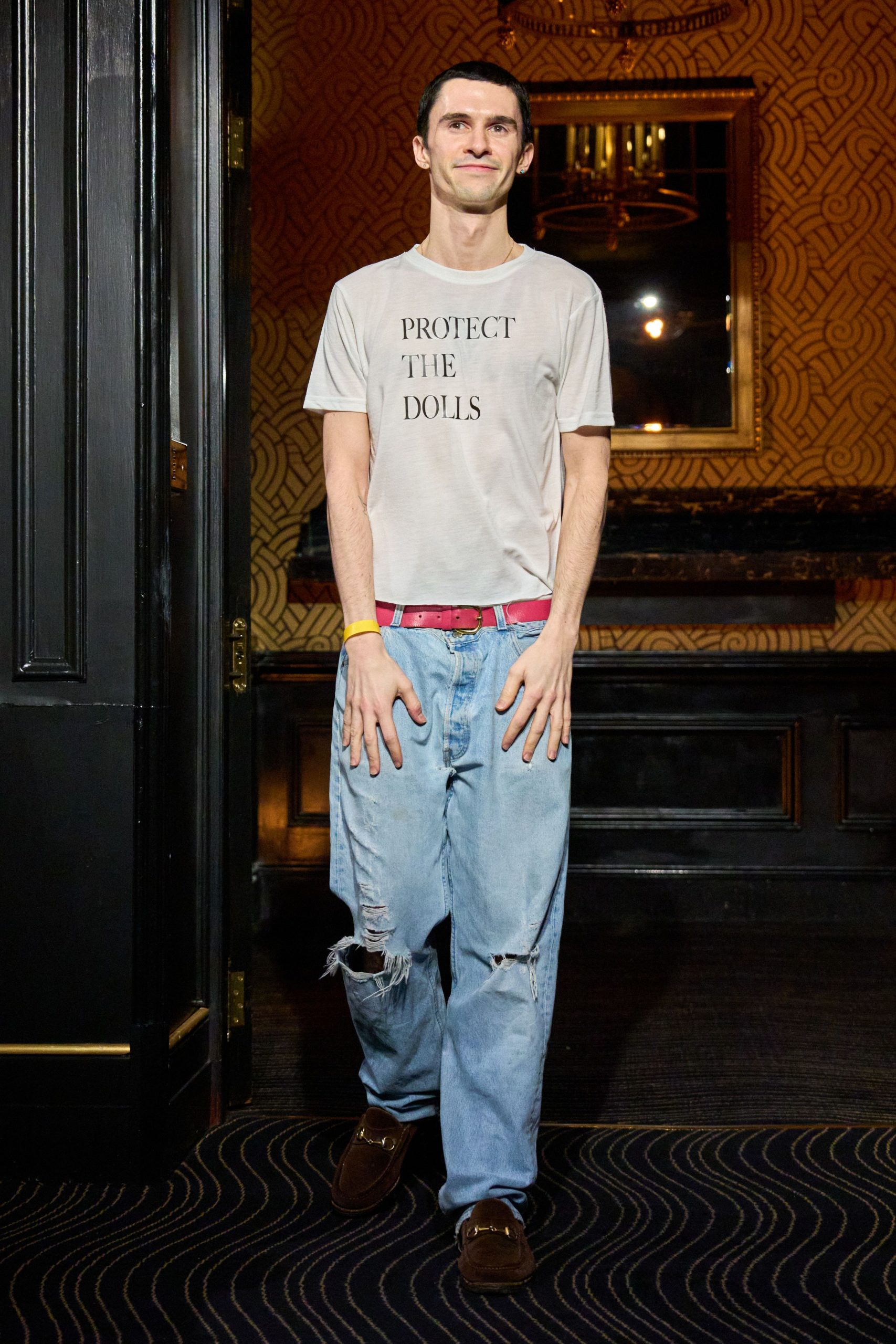 gray t-shirt with distressed jeans