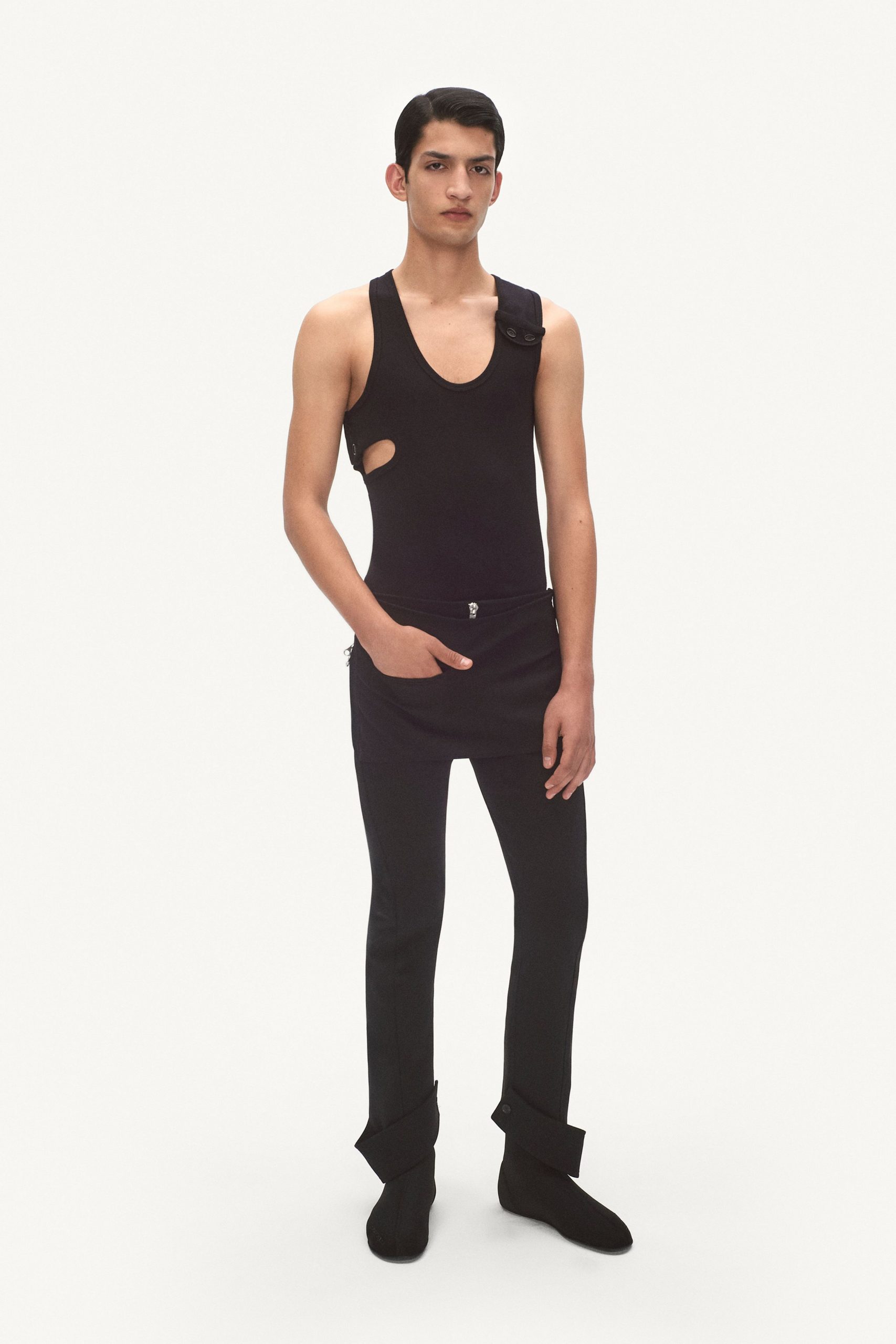 black bodysuit and pants with boots