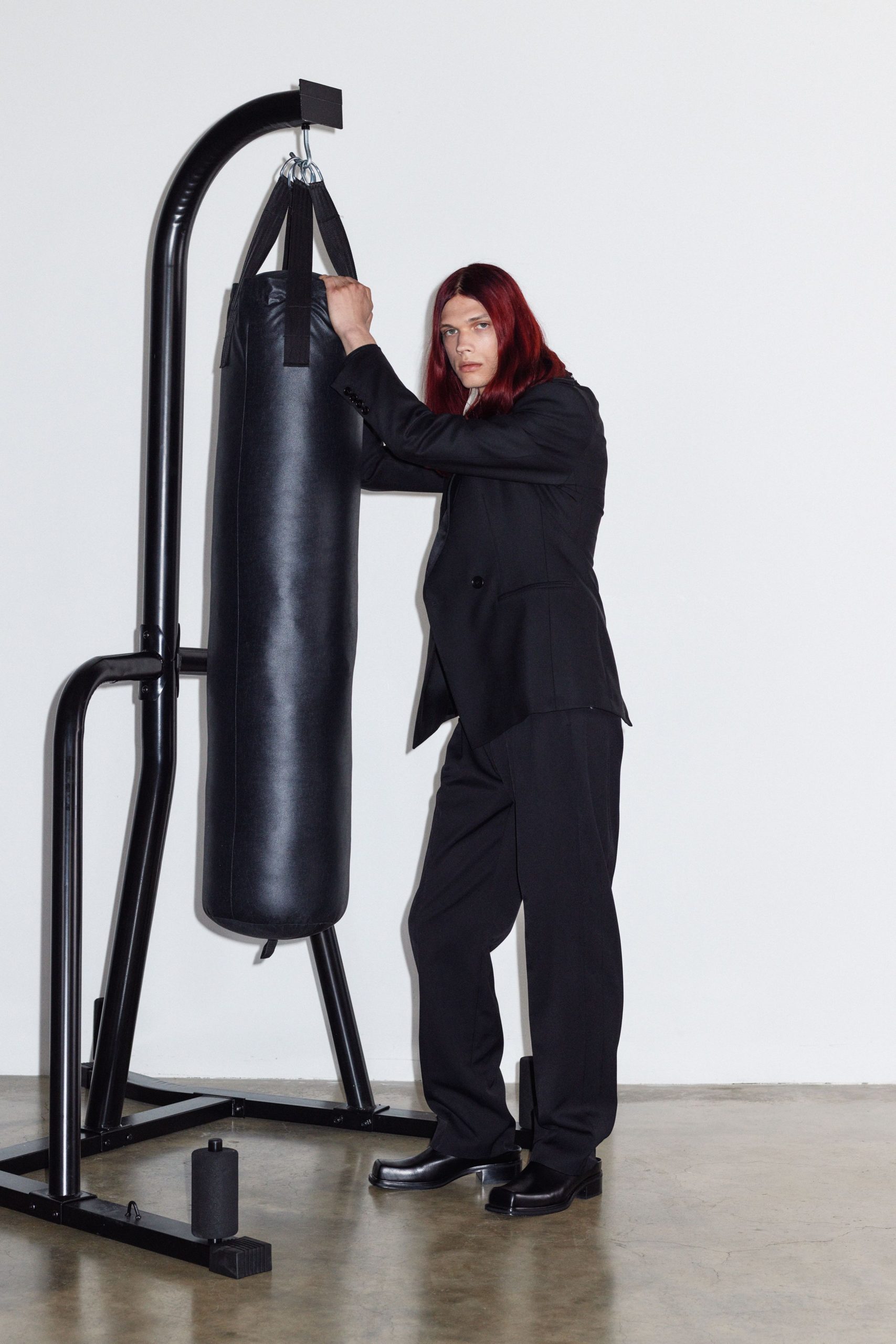 black tailored suit with boots