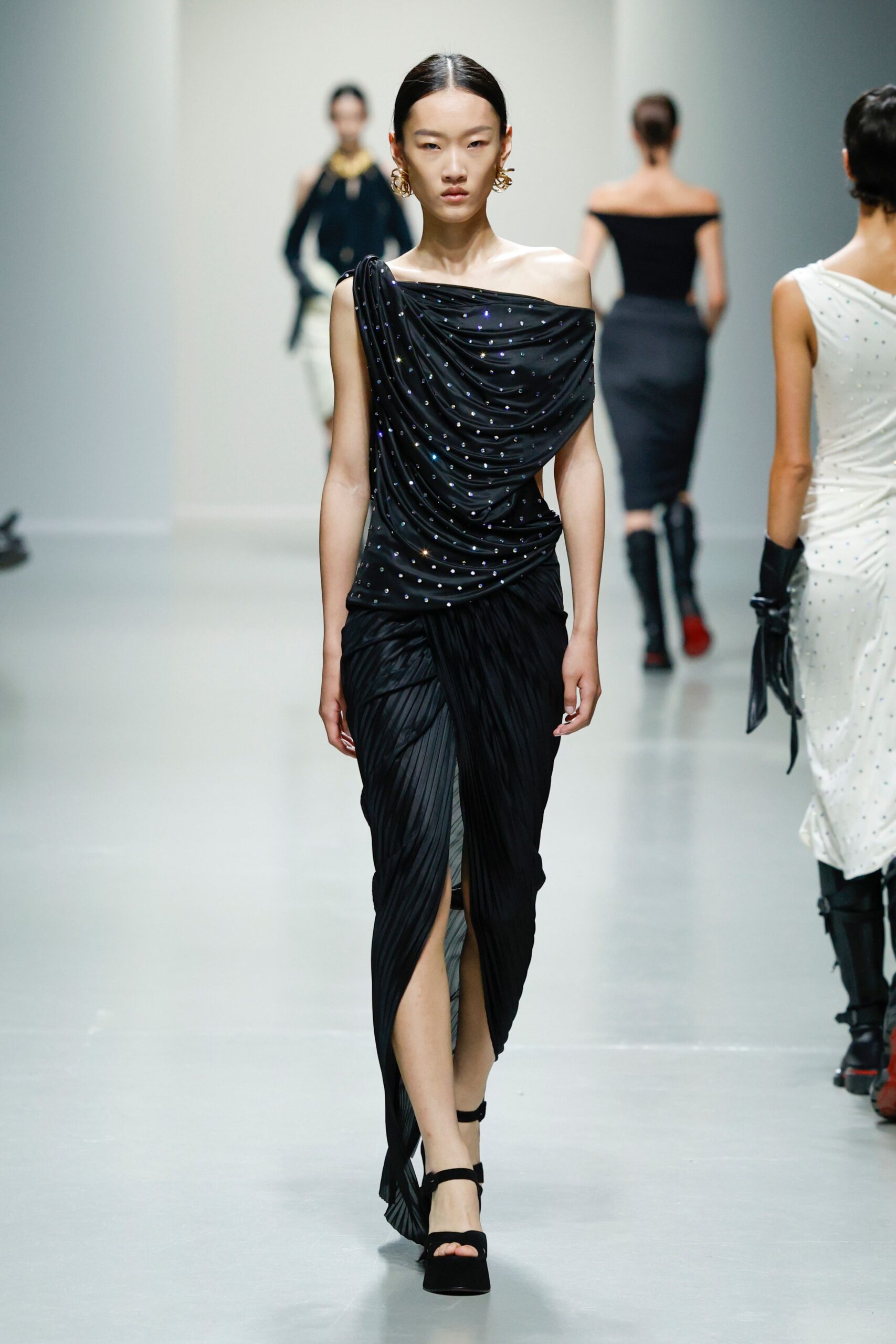 black silk sleeveless off-shoulder fitted pleated draped dress