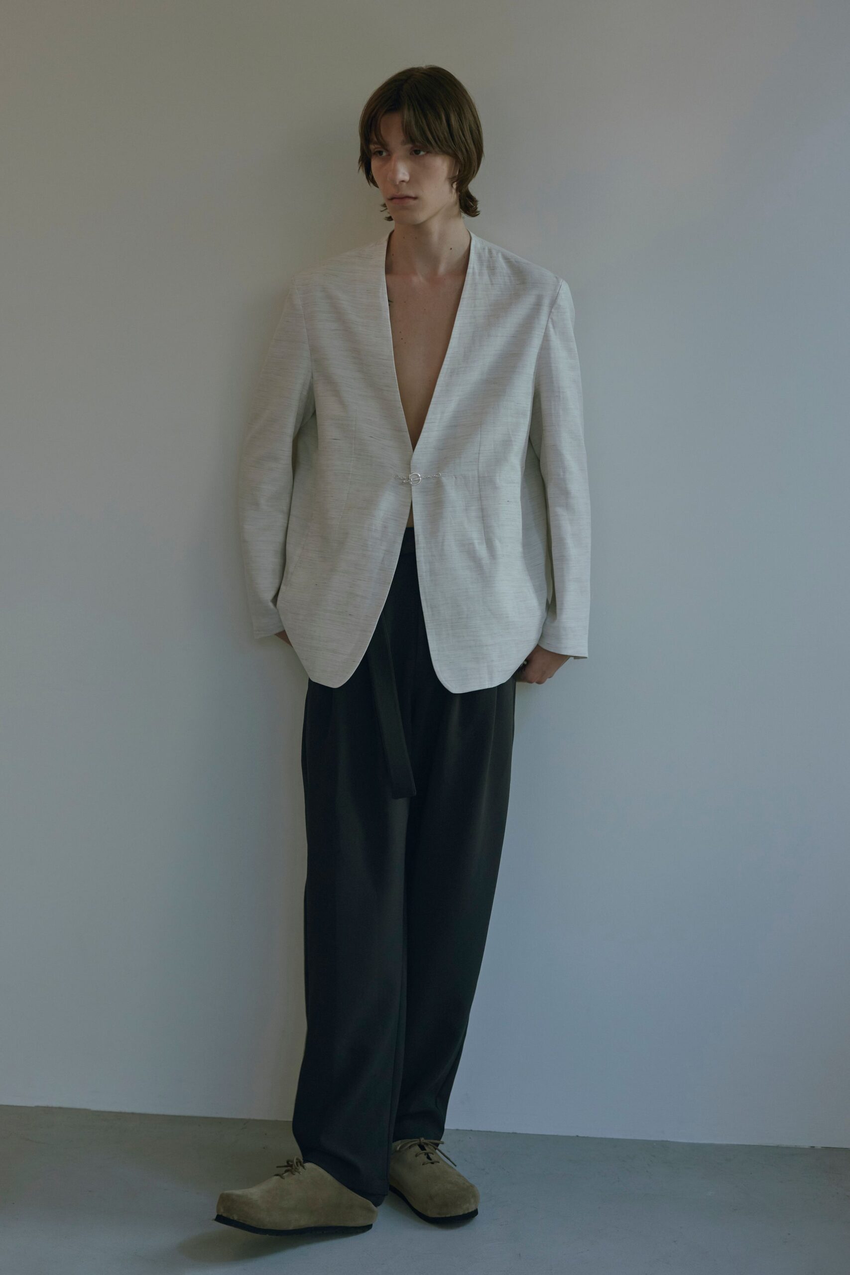 white relaxed blazer with black pants
