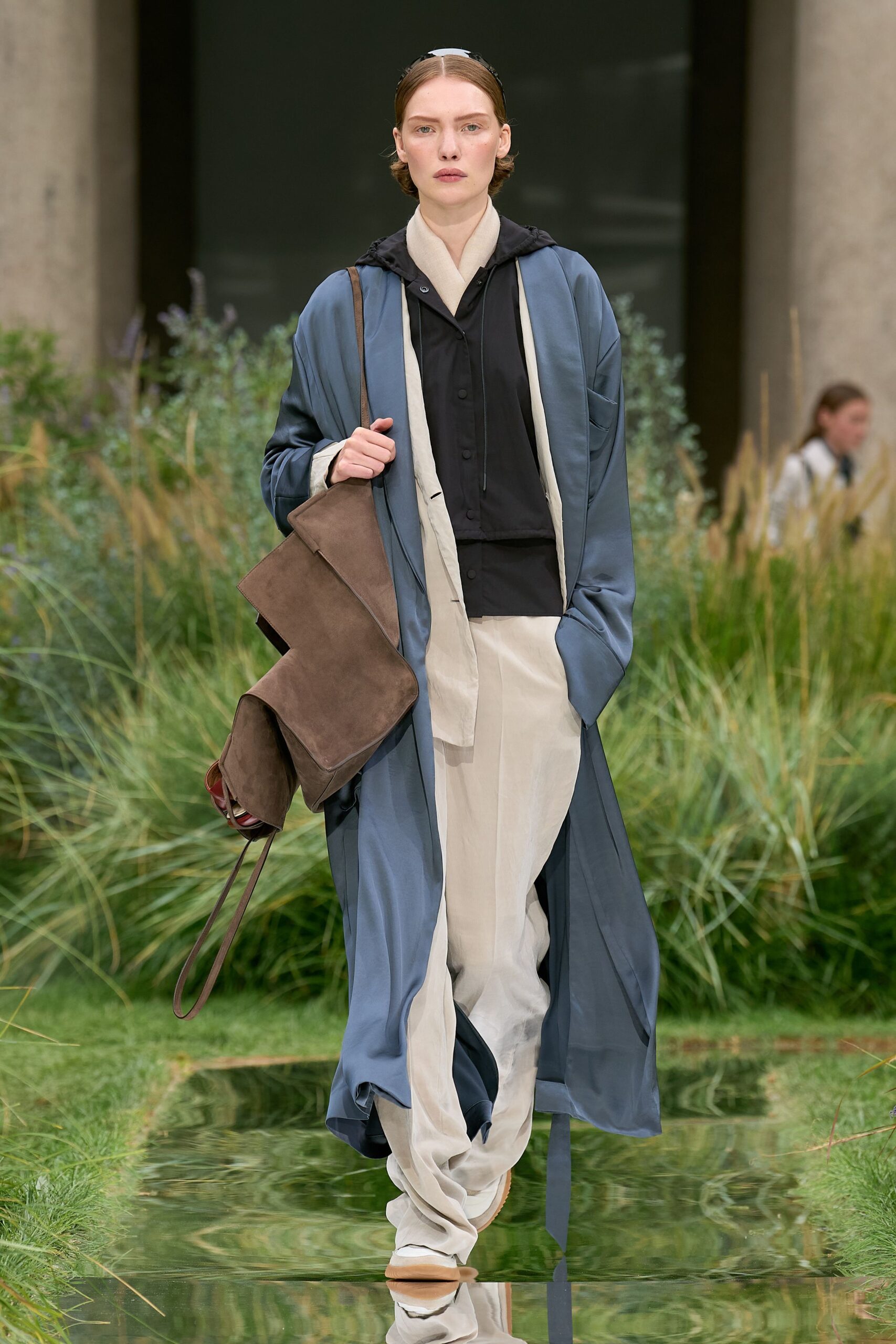 blue silk coat with beige pants