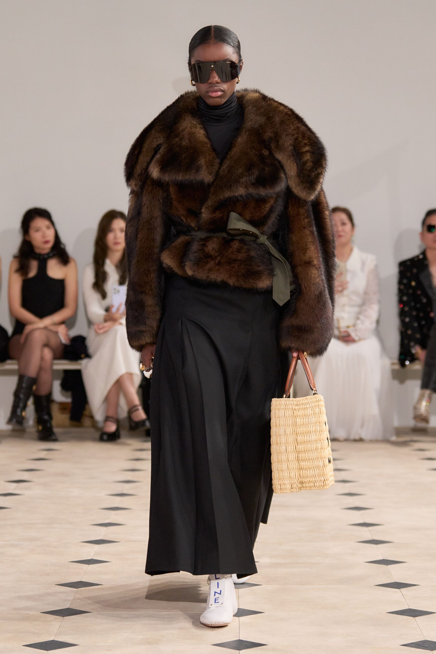 fur coat with black skirt