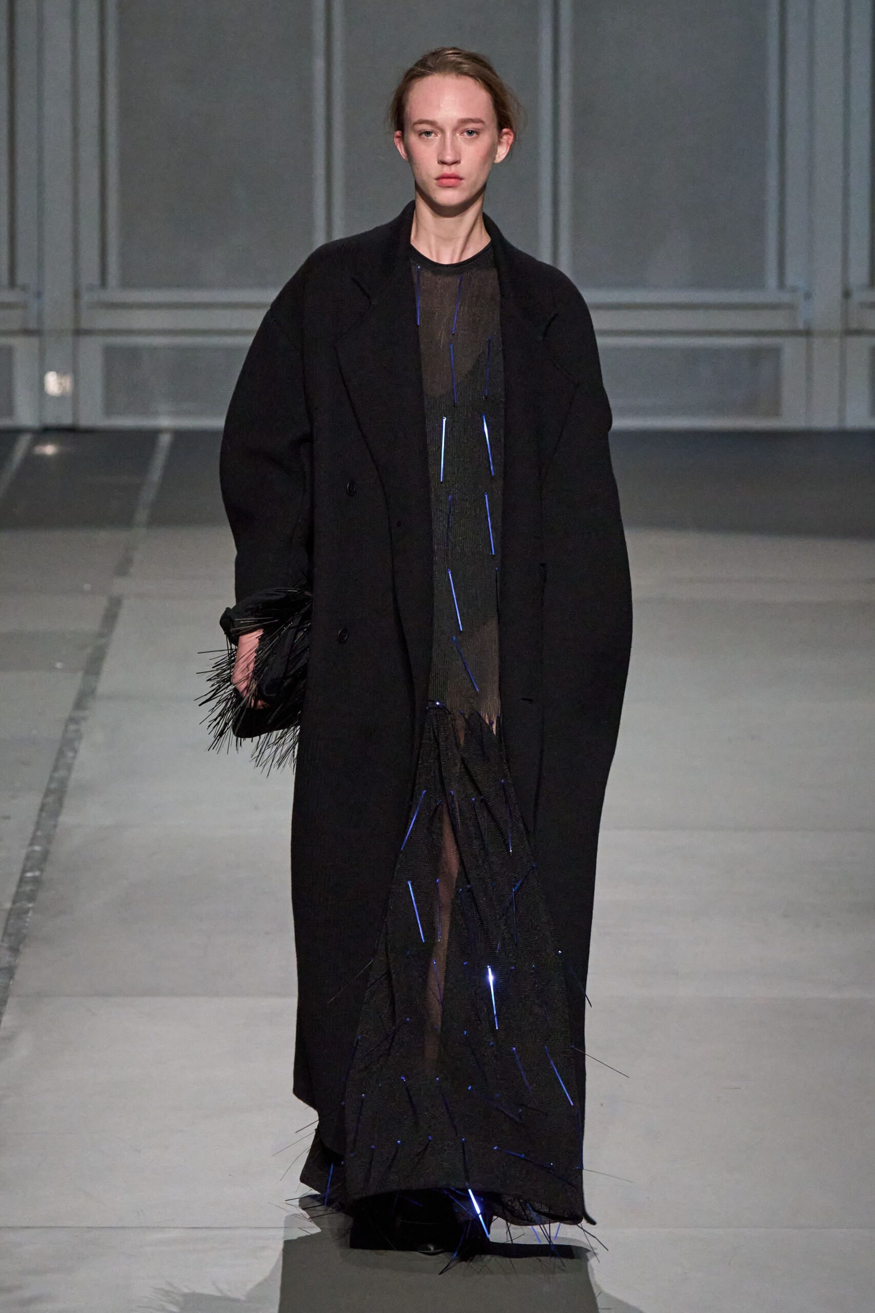 black oversized coat with sheer dress