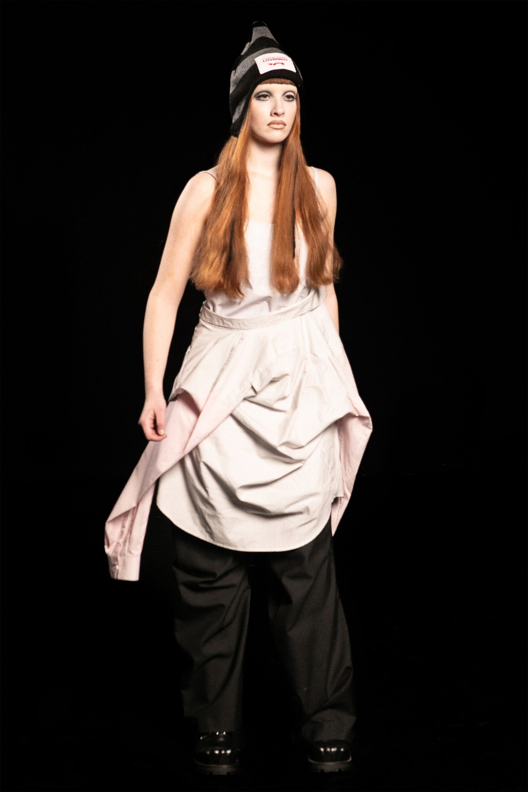 white sleeveless top with pink skirt