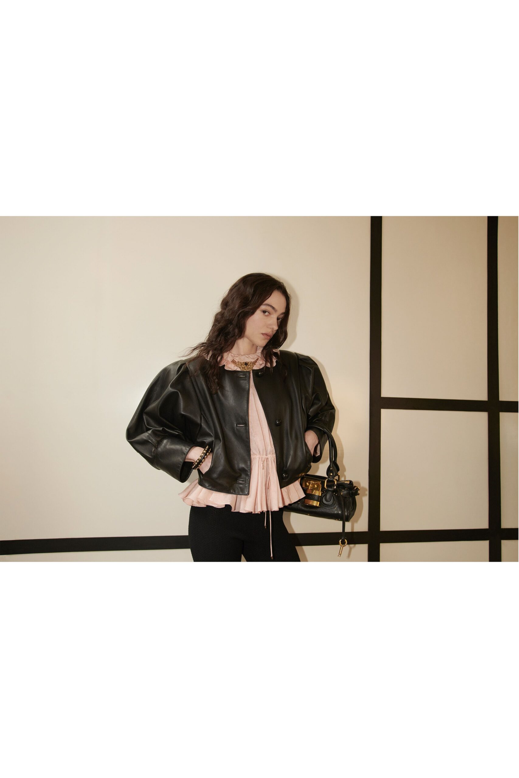 black leather long-sleeve collared oversized buttoned padded jacket