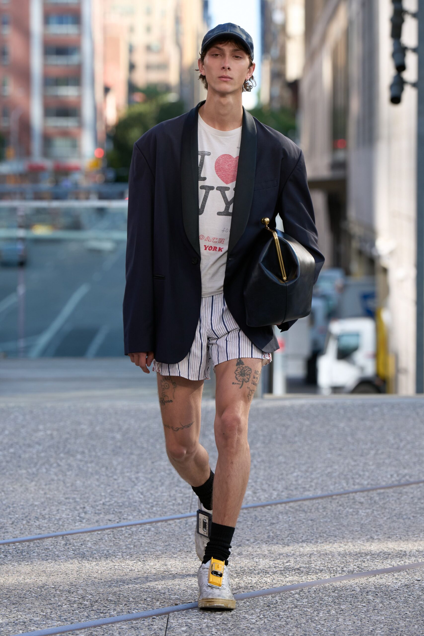black blazer white t-shirt striped shorts