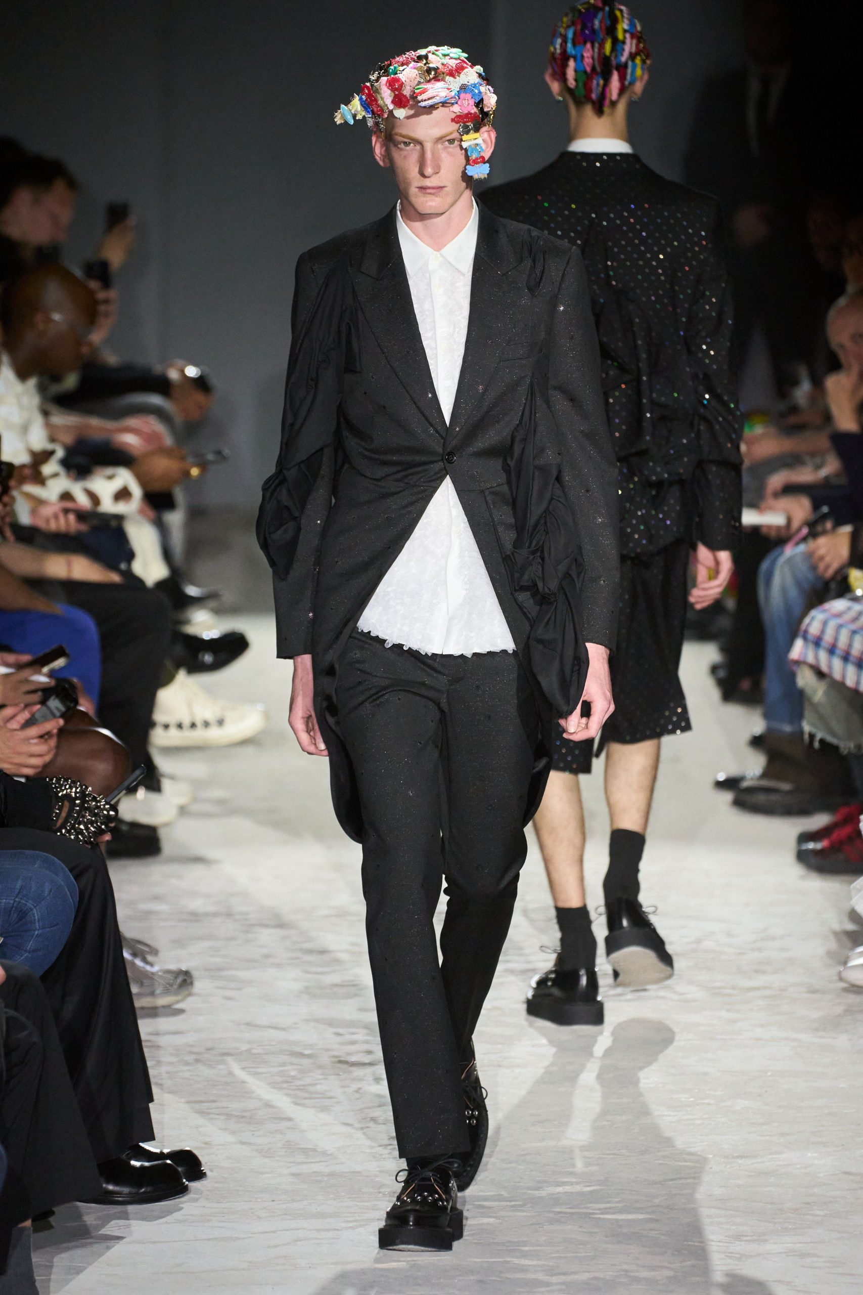 black tailored suit with white shirt