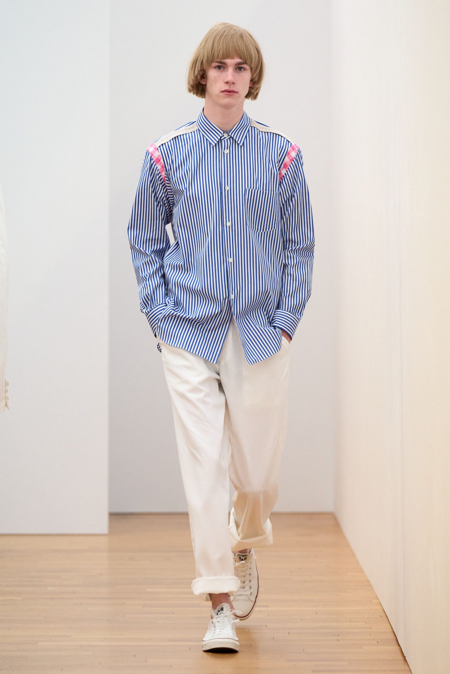blue and white striped shirt with white pants