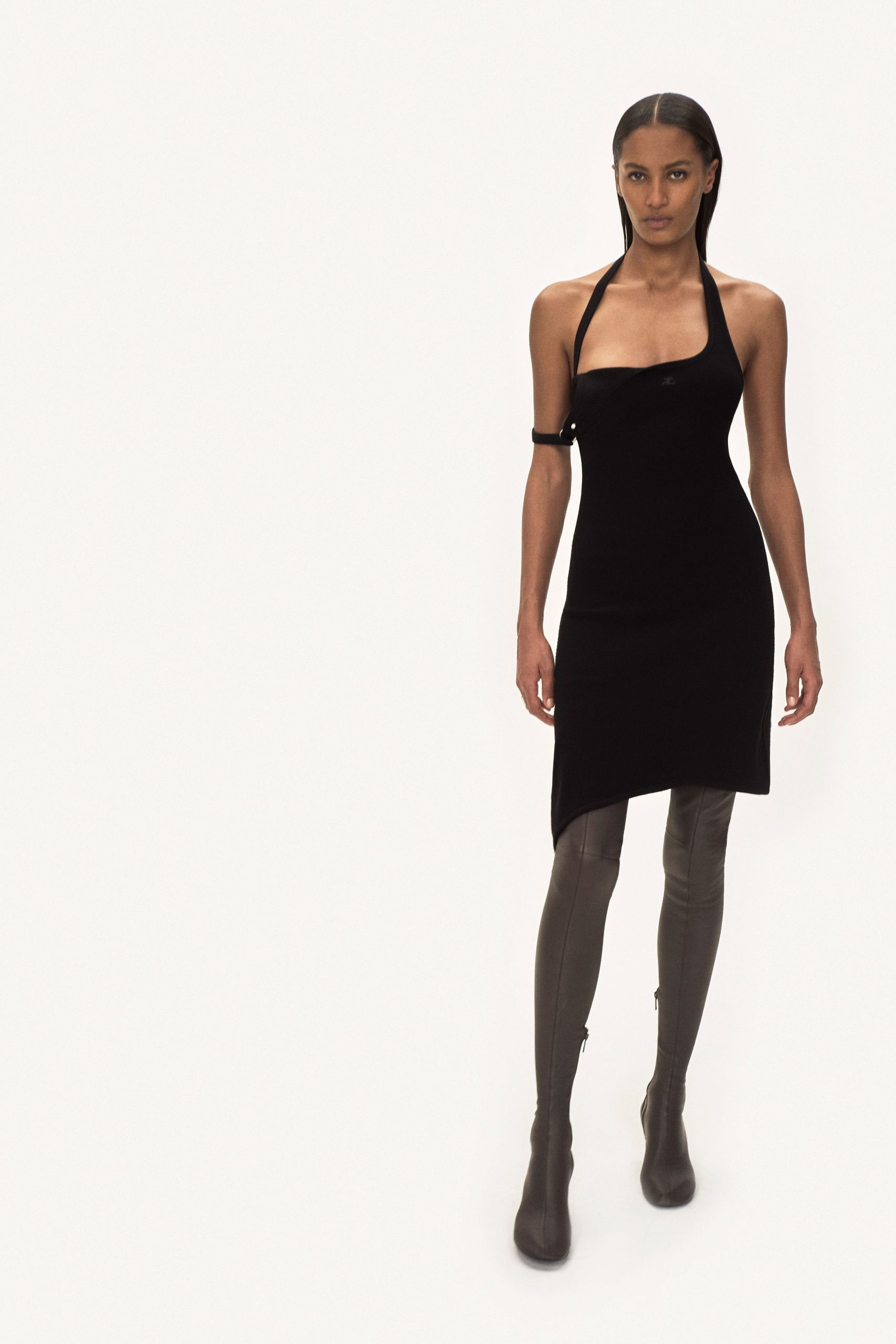 black fitted halter dress with gray boots