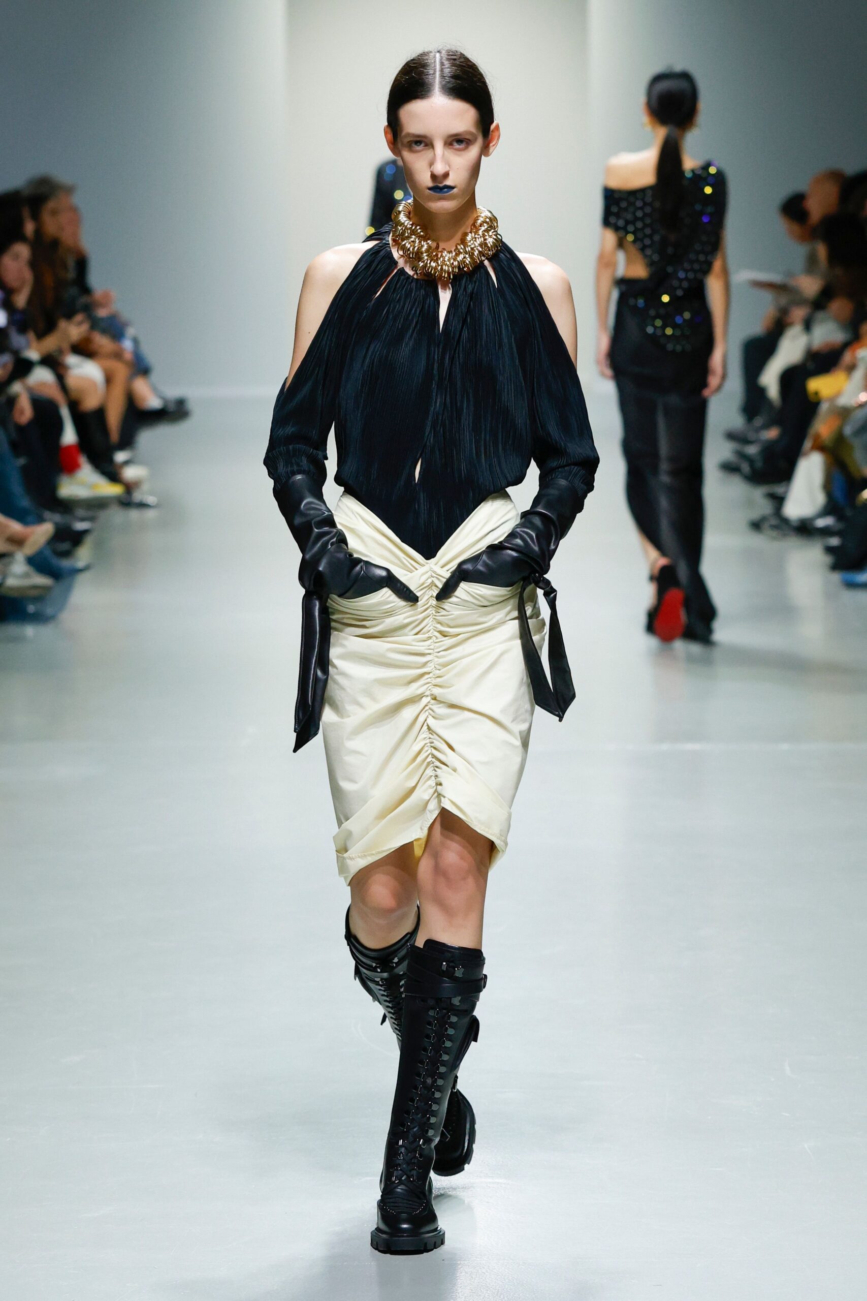 black silk off-shoulder top with white ruched skirt