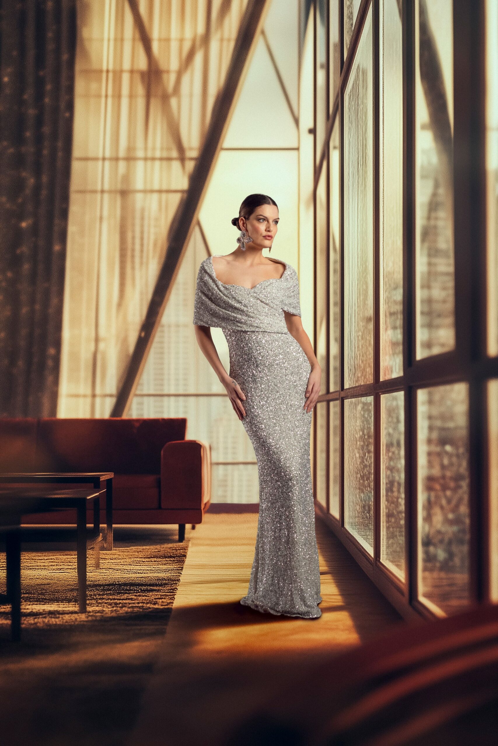 silver sequined off-shoulder gown