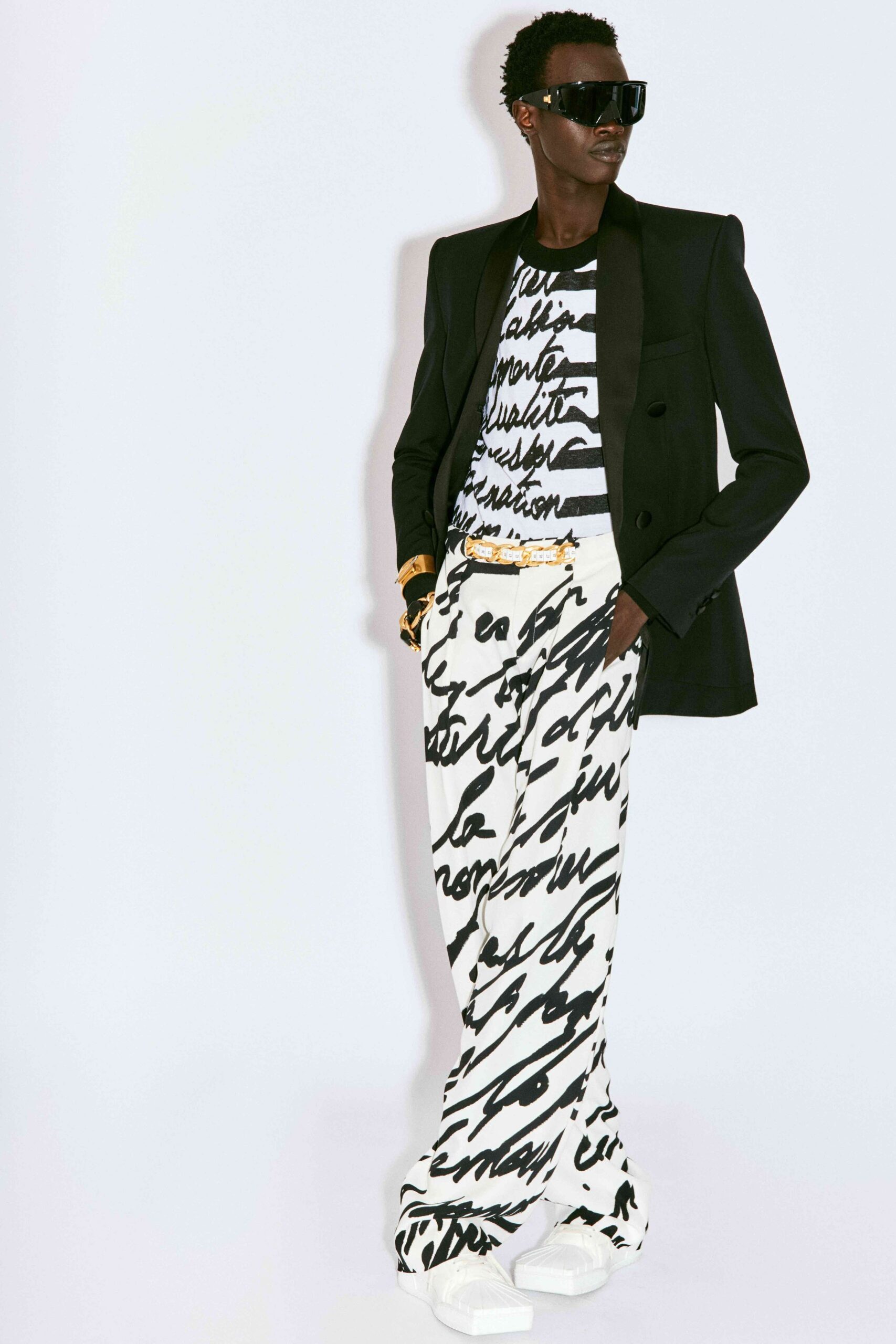 black blazer with printed top and pants