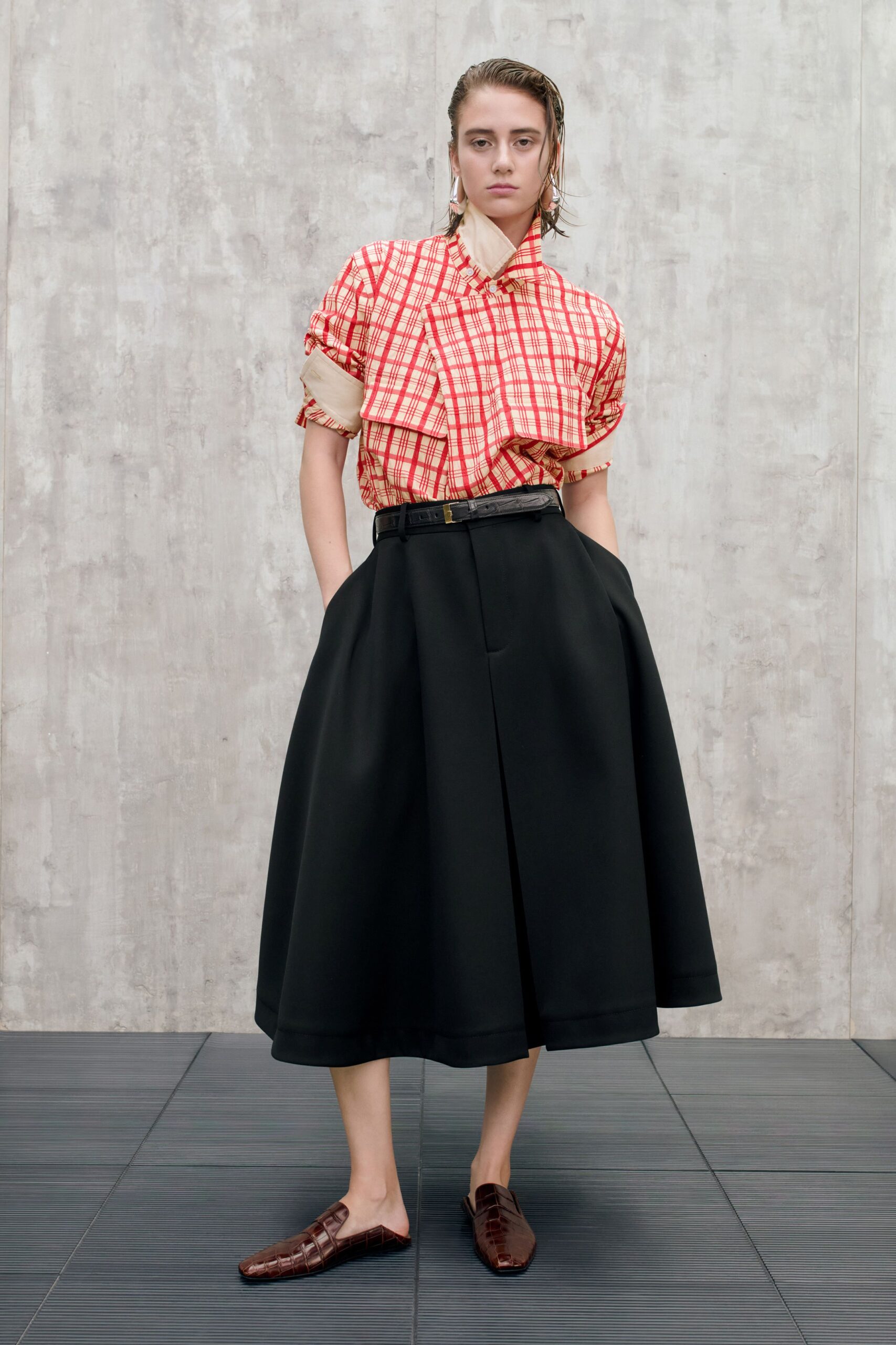 red and white checked shirt with black skirt