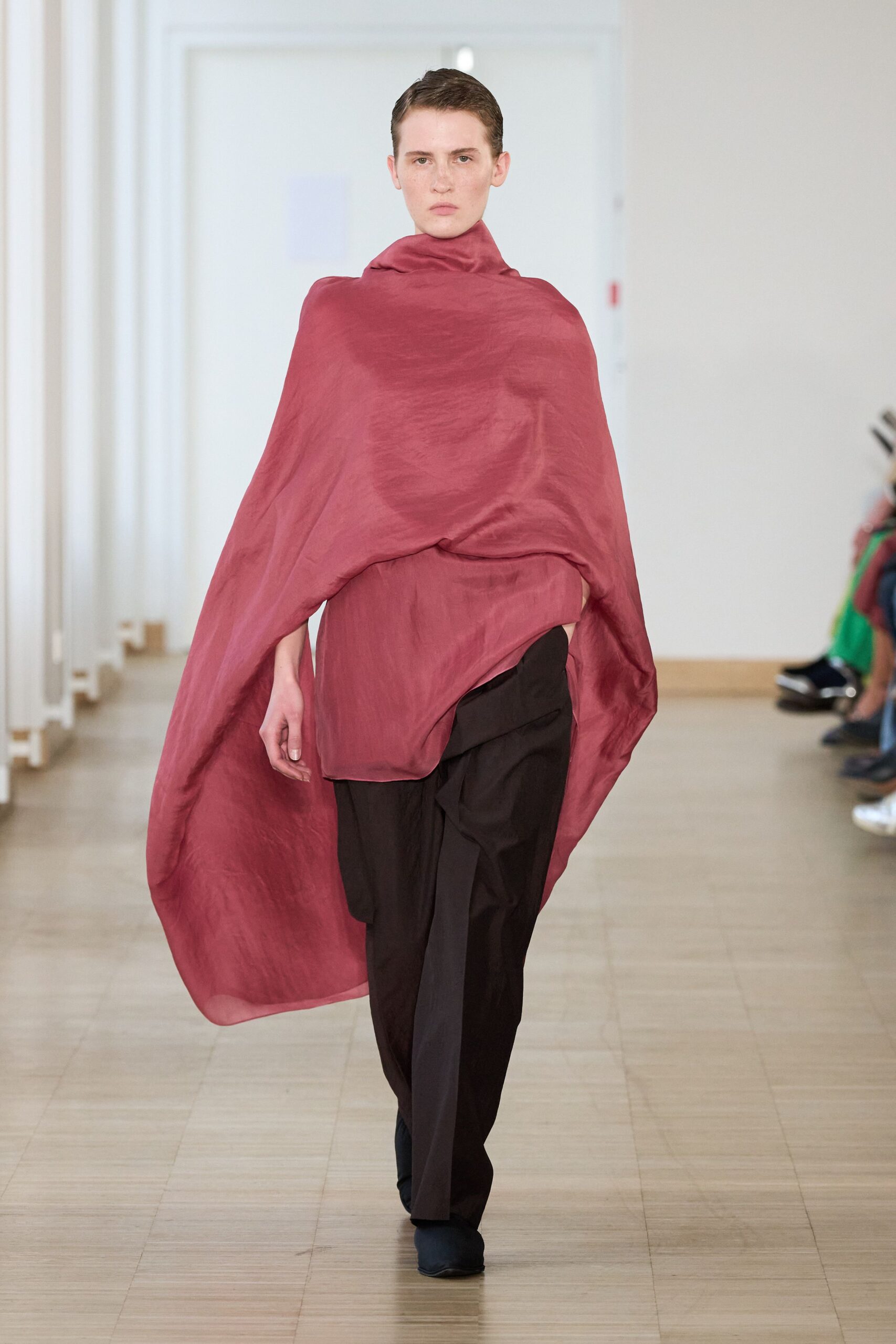 red silk poncho with black pants