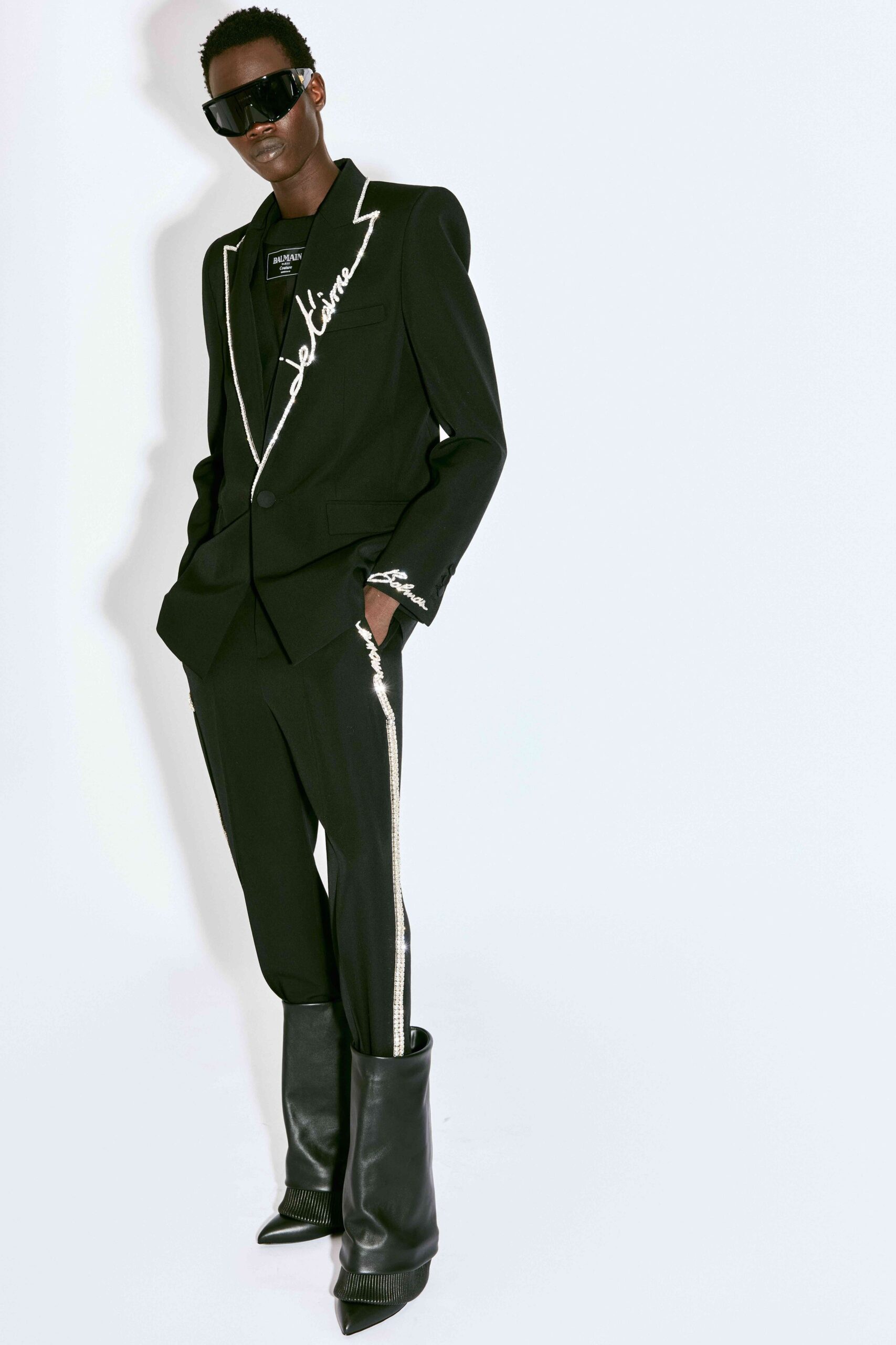 black tailored suit with boots