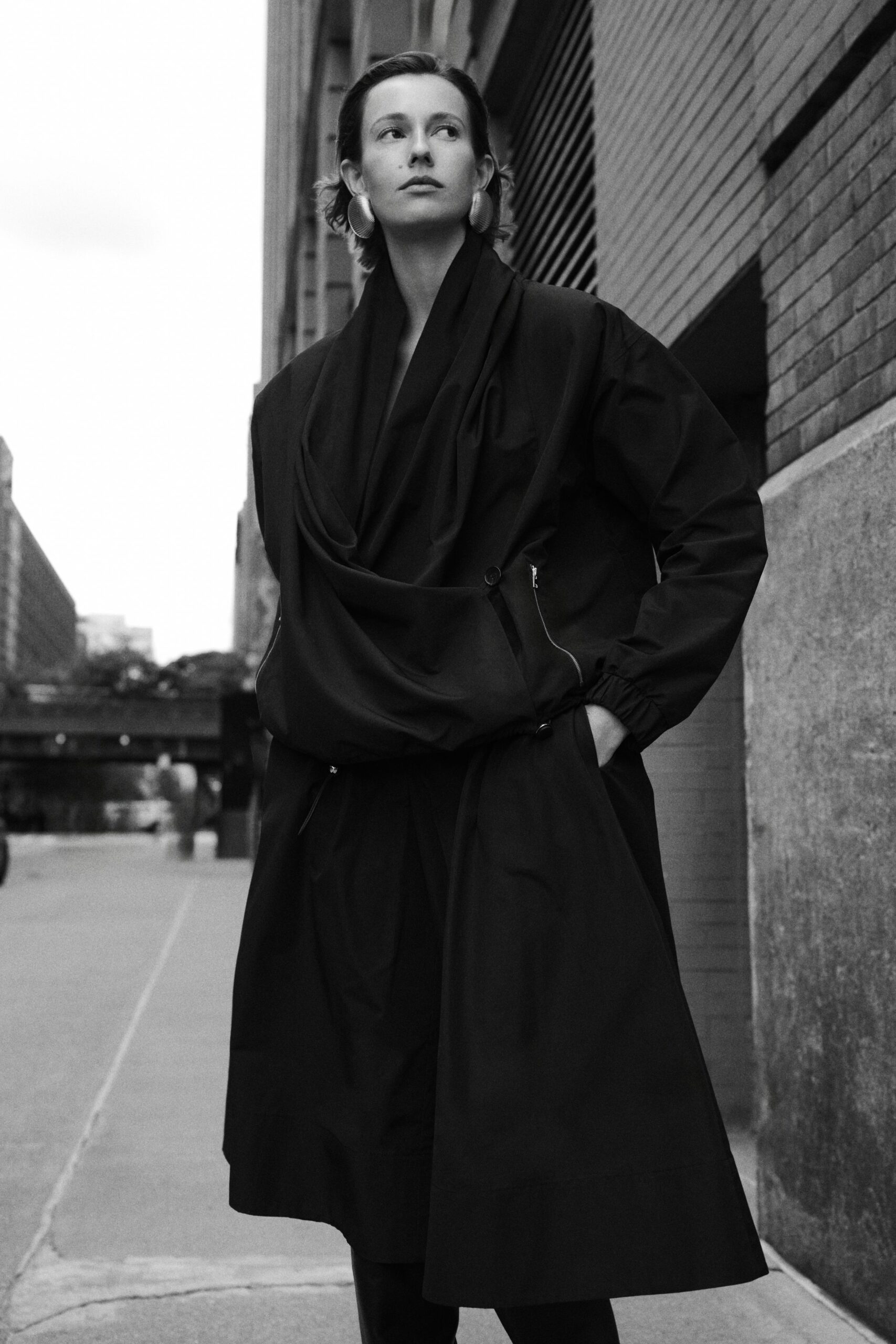 black wool long-sleeve high-neck oversized draped layered coat