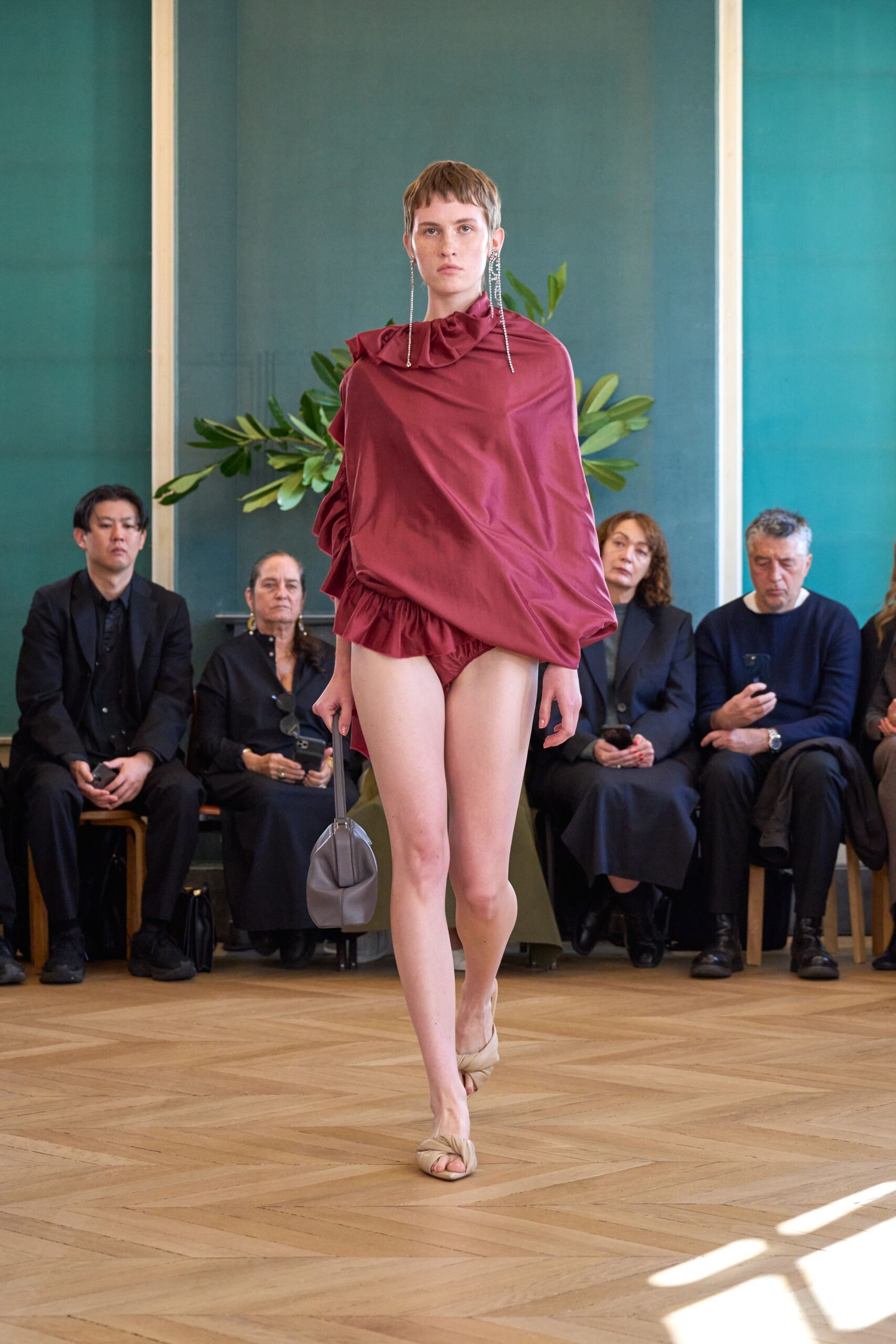 red silk sleeveless high-neck relaxed draped top