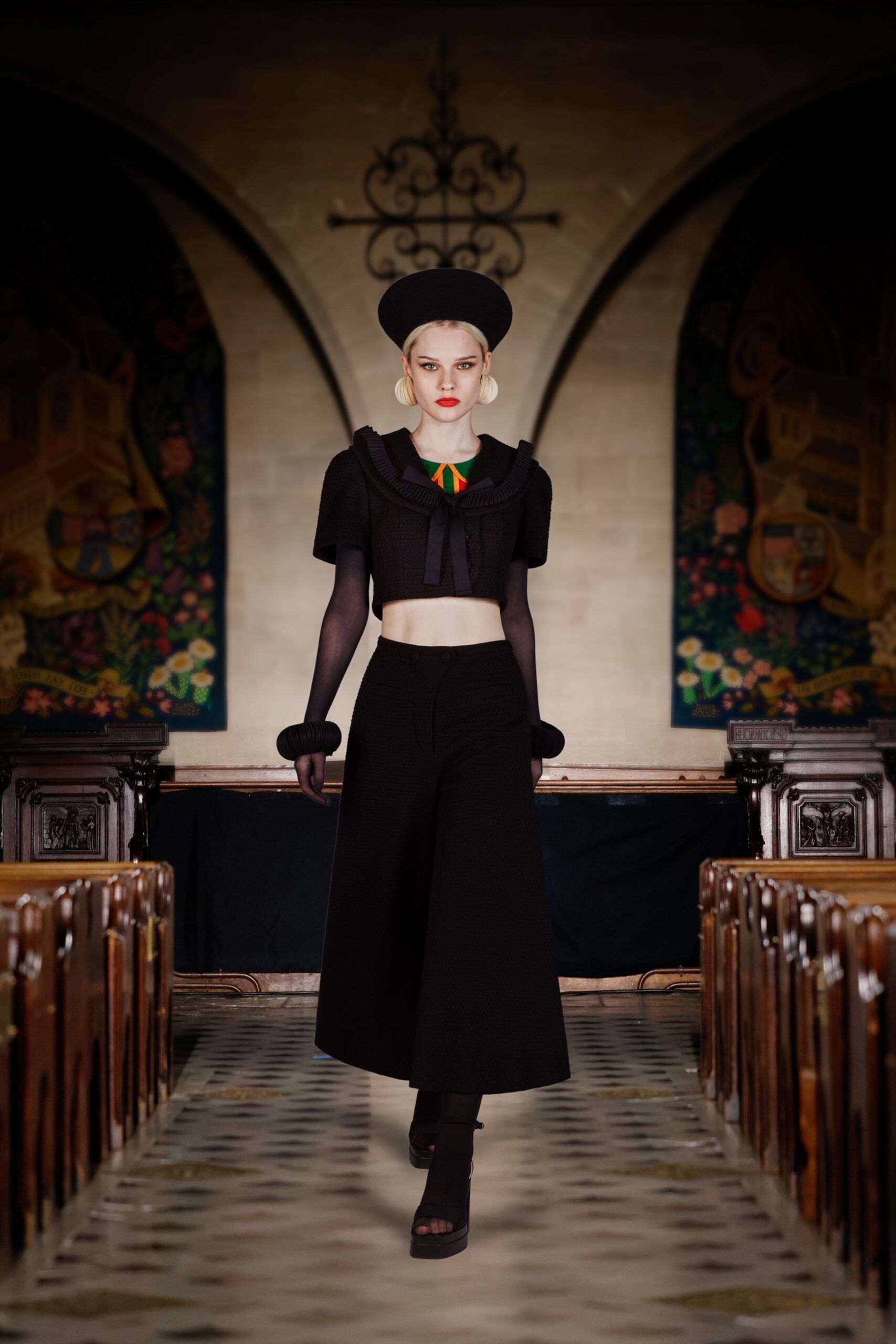 black fitted top and wide-leg pants