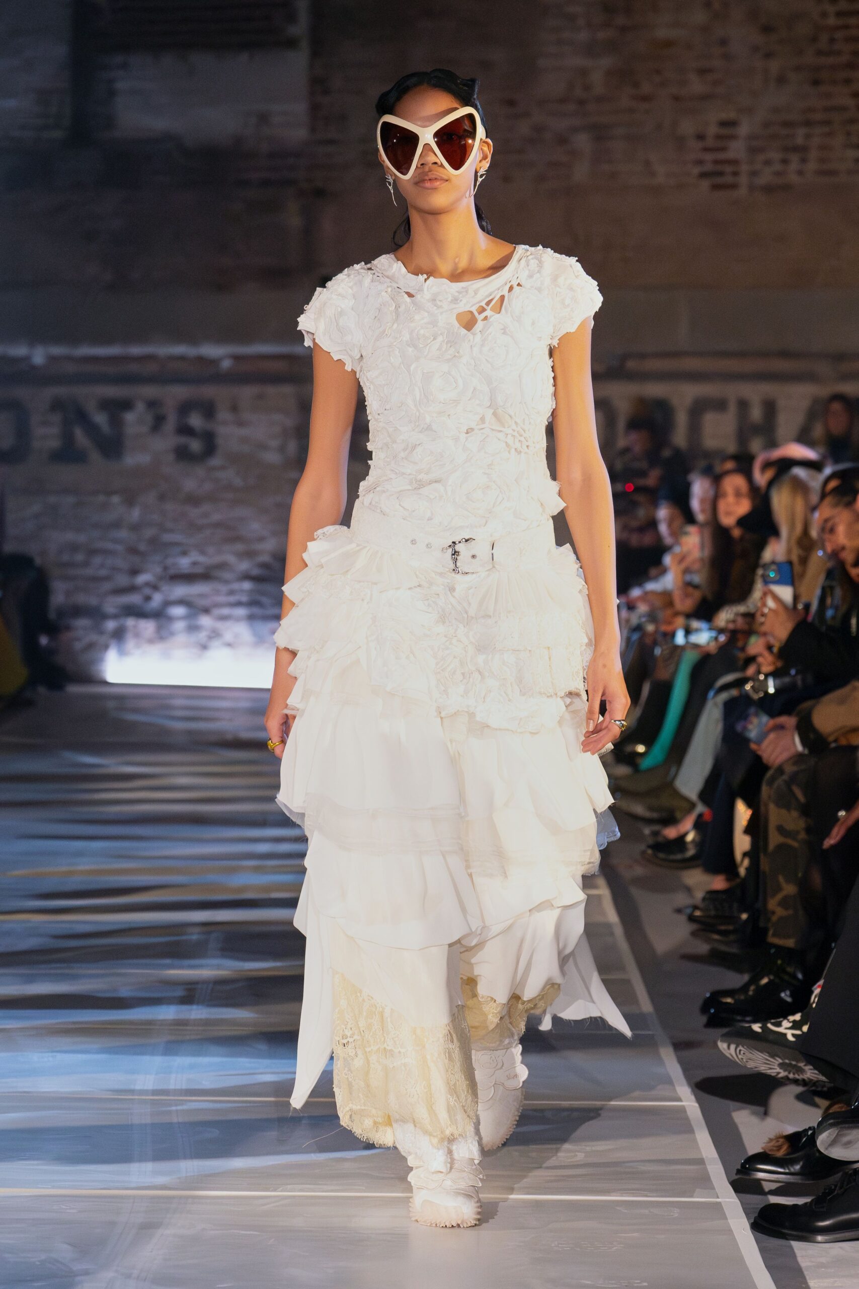 white ruffled midi dress with oversized sunglasses