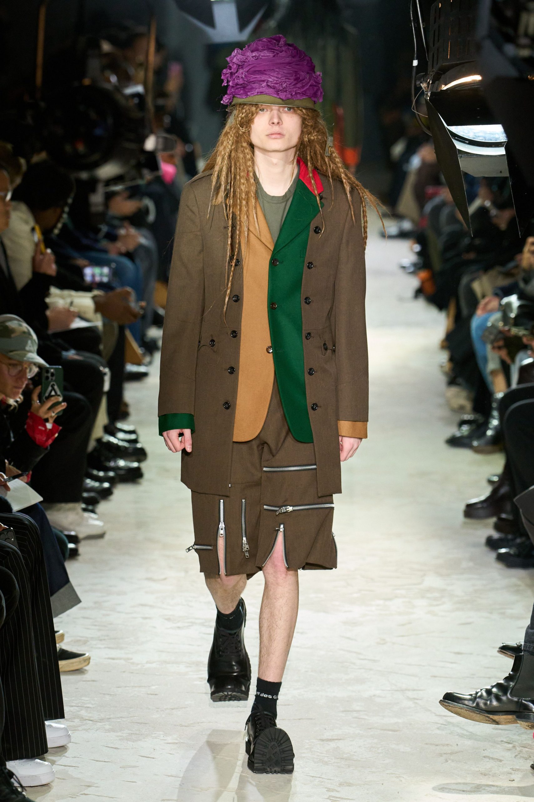 brown coat with purple hat