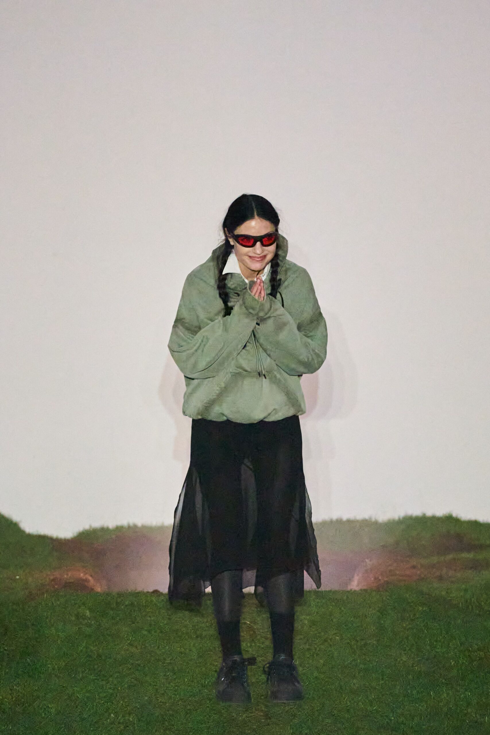 green hoodie black skirt