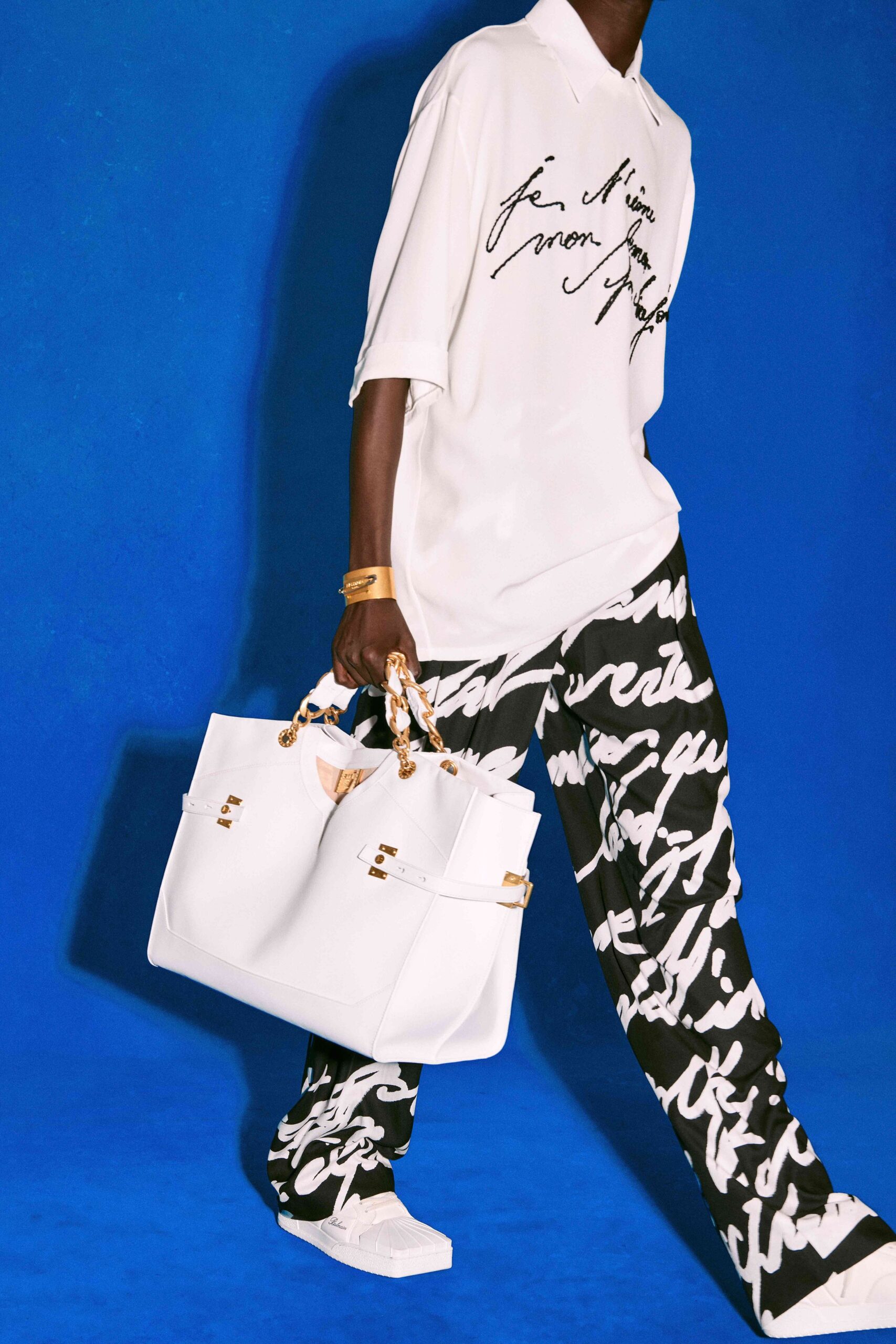 white shirt black and white pants
