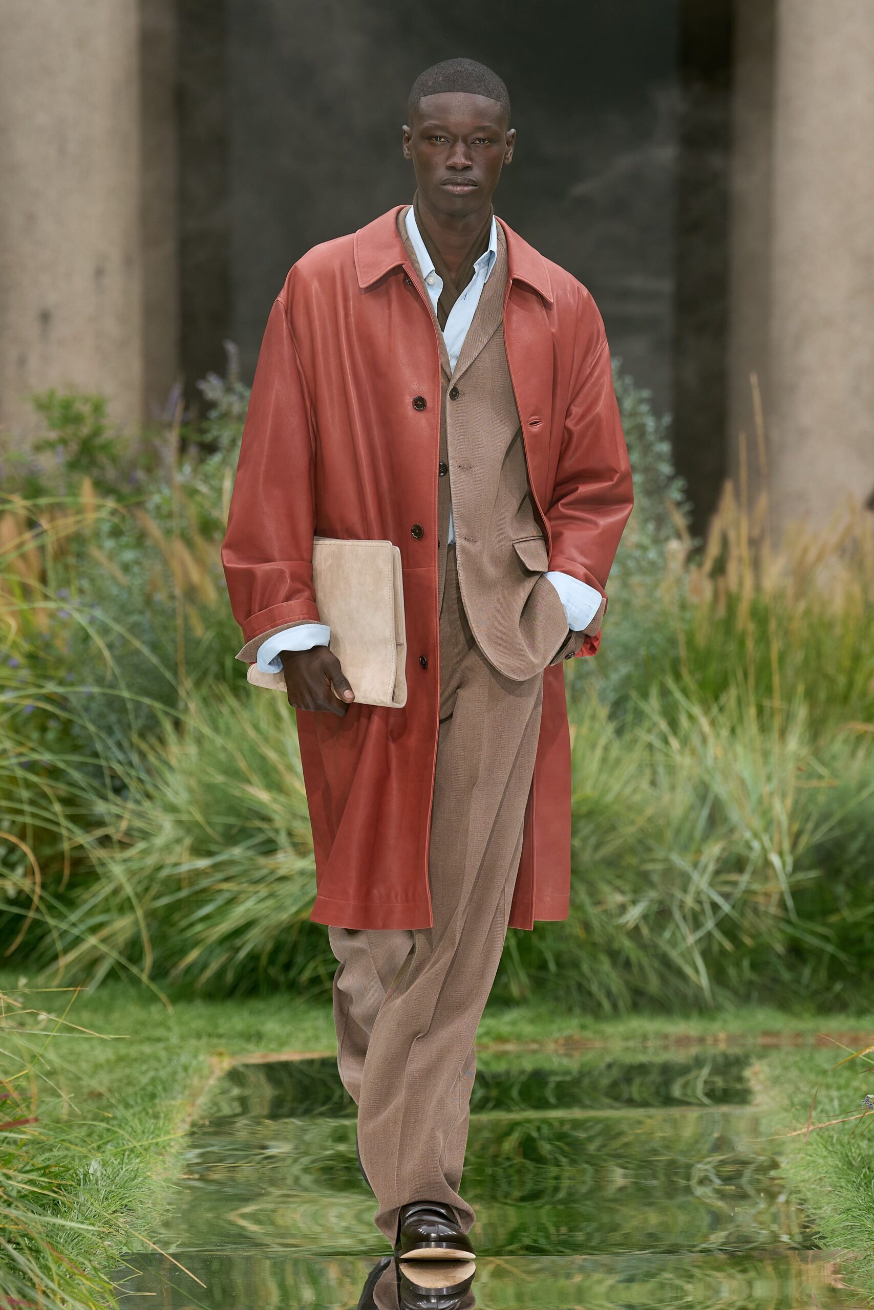 red leather coat with beige vest
