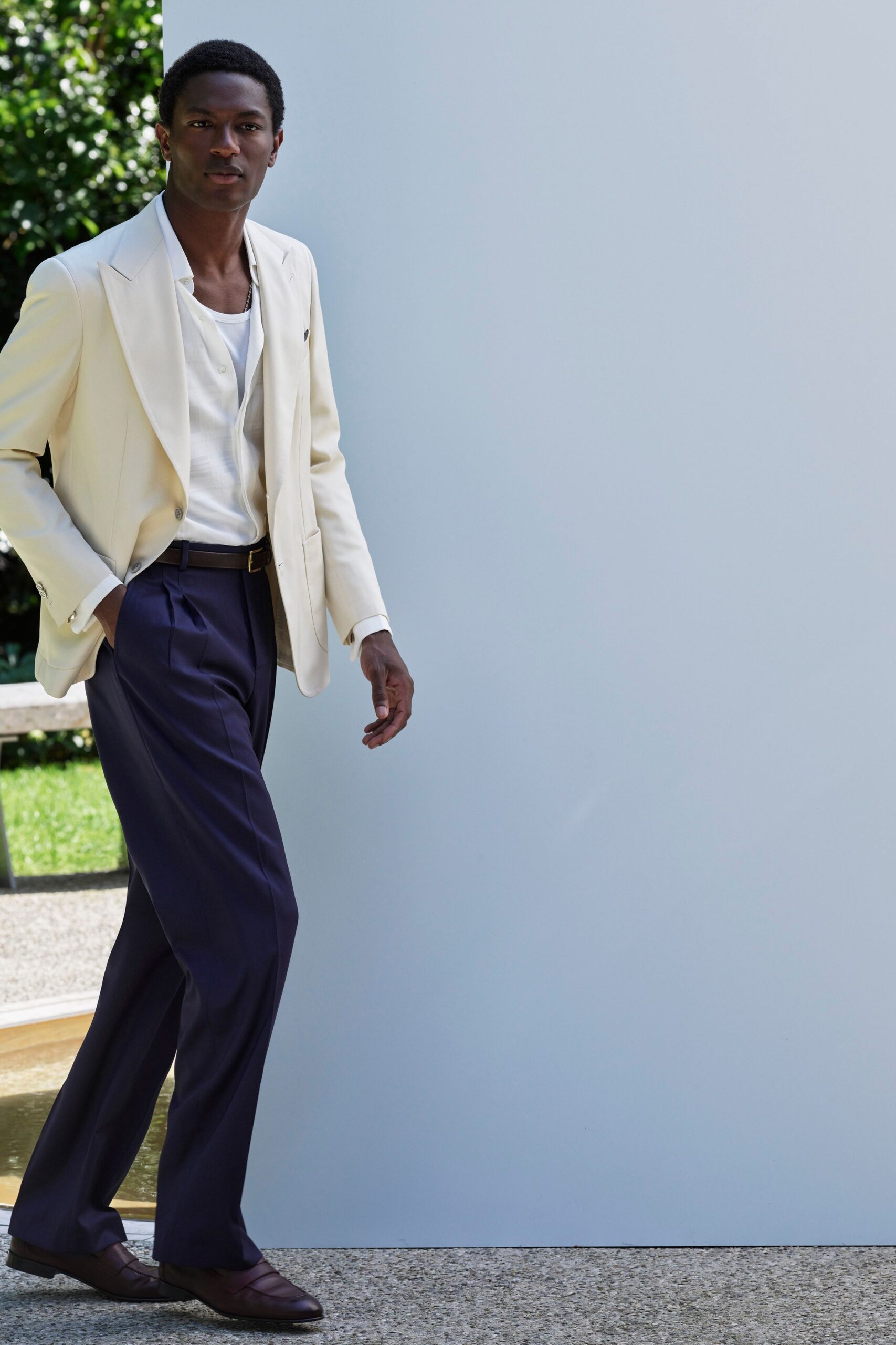 white blazer with navy pants