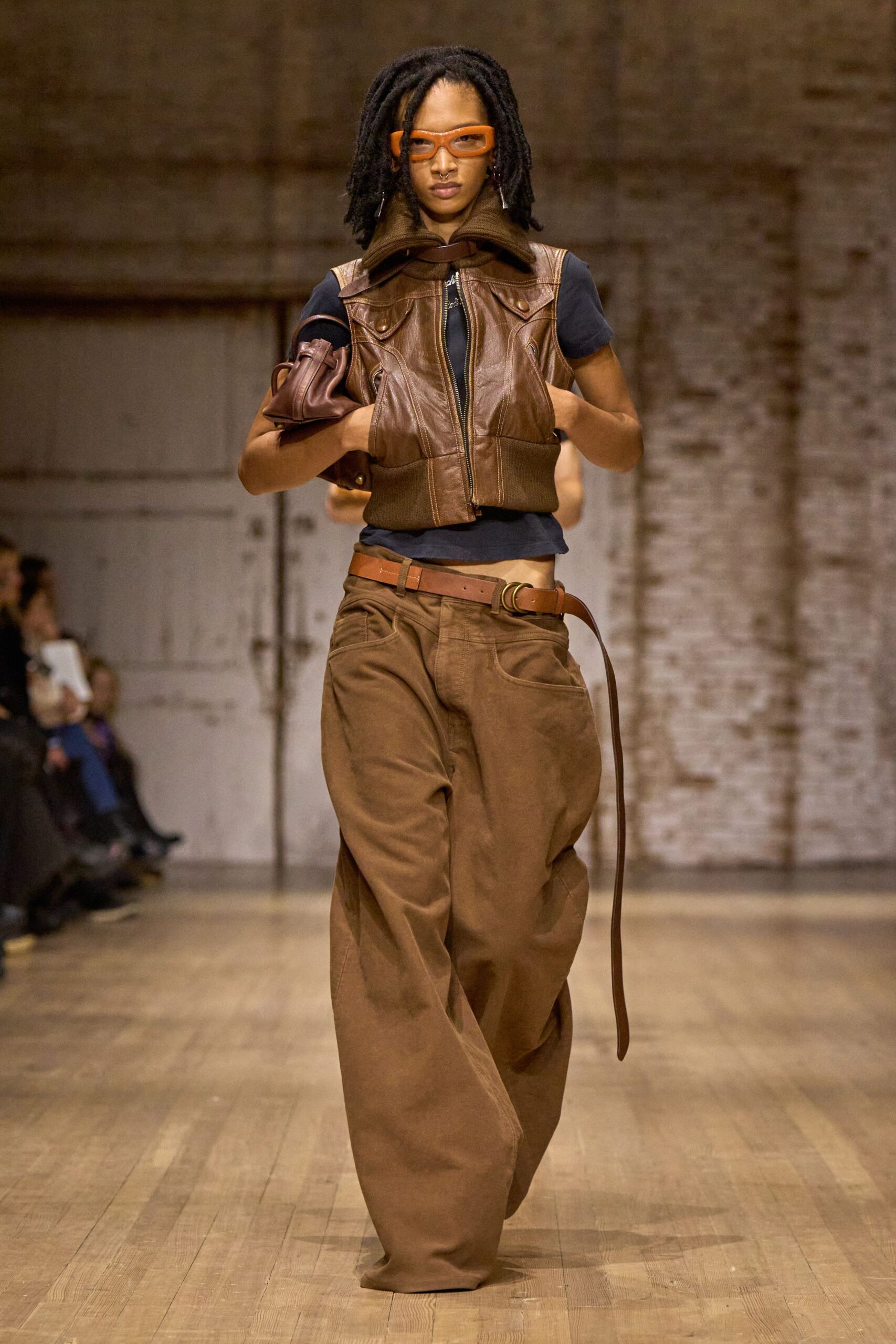 brown leather vest with black top