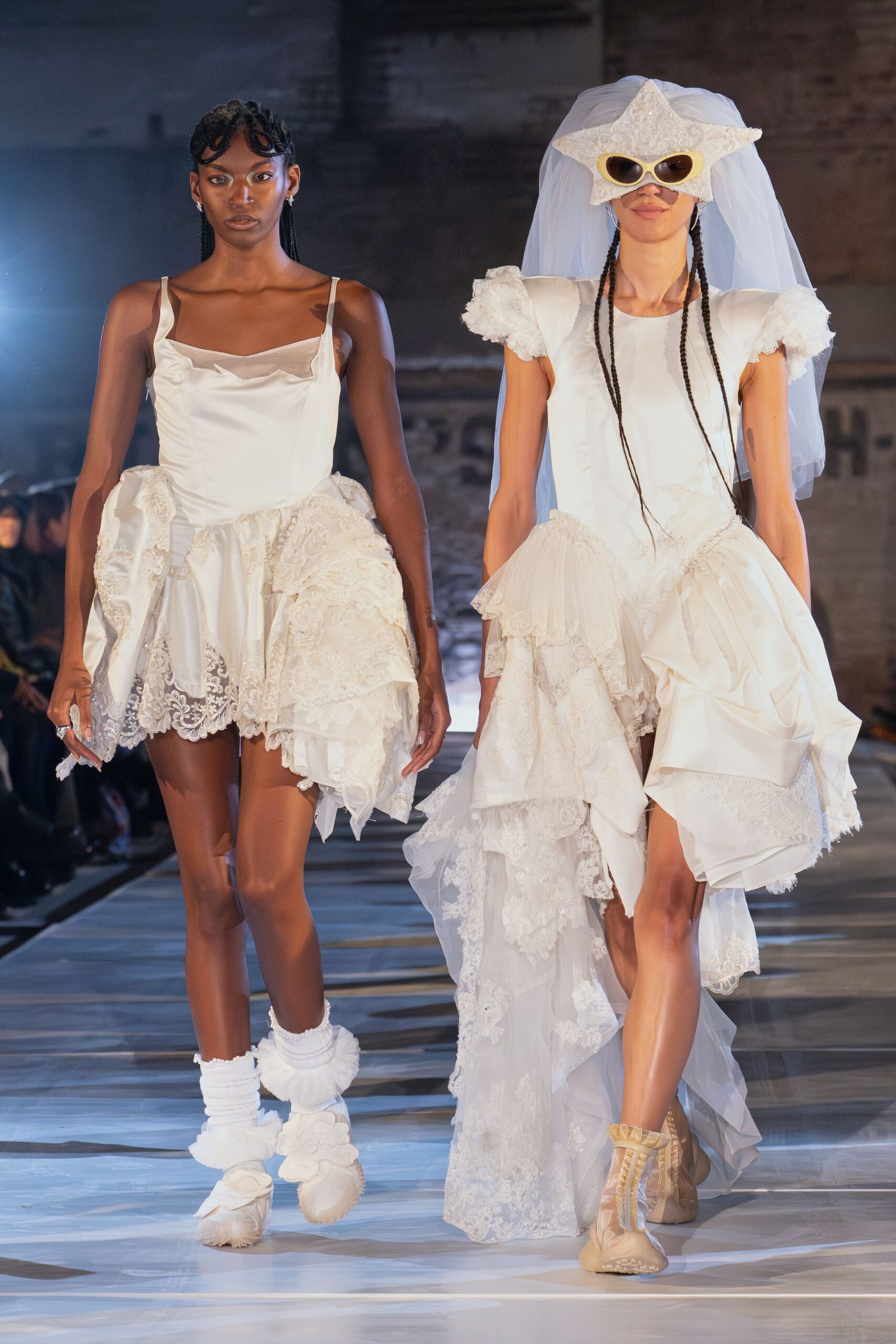 white ruffled mini dress and white draped maxi dress