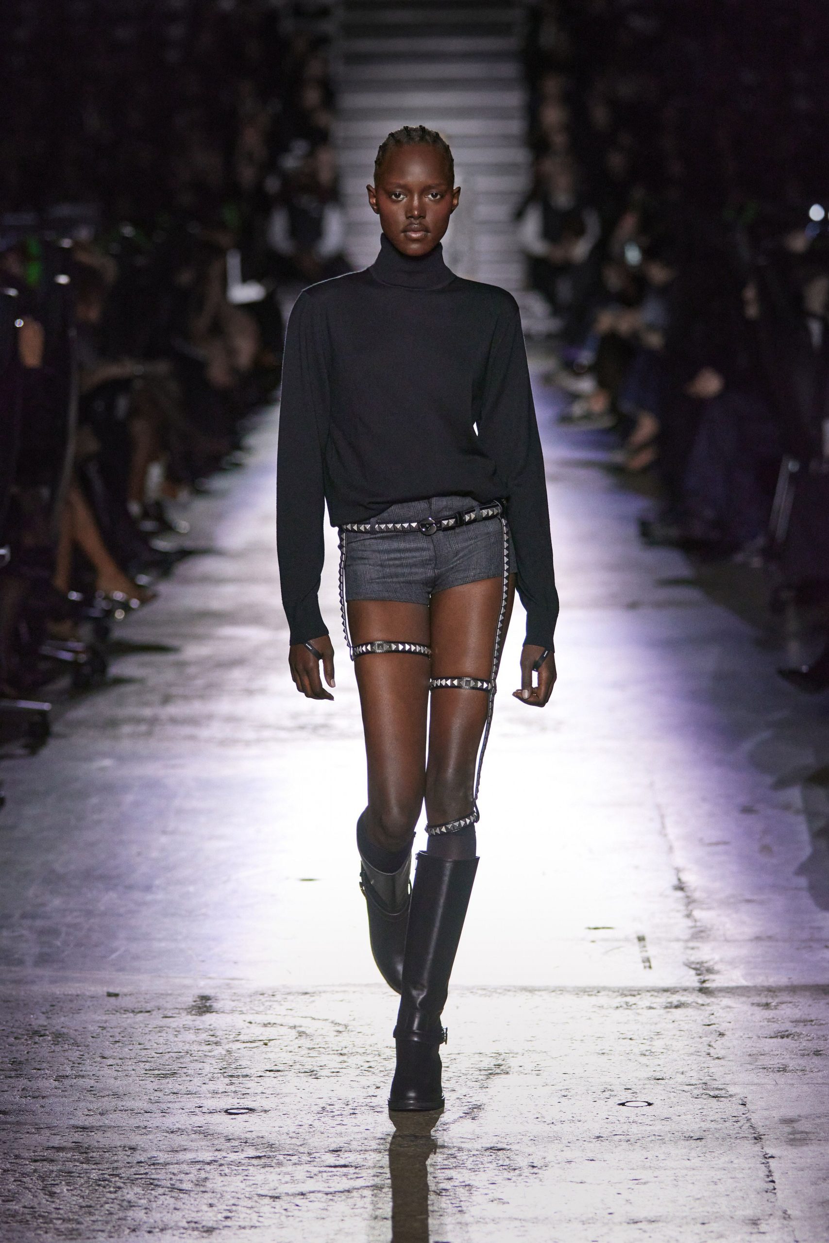 black fitted turtleneck top with denim shorts
