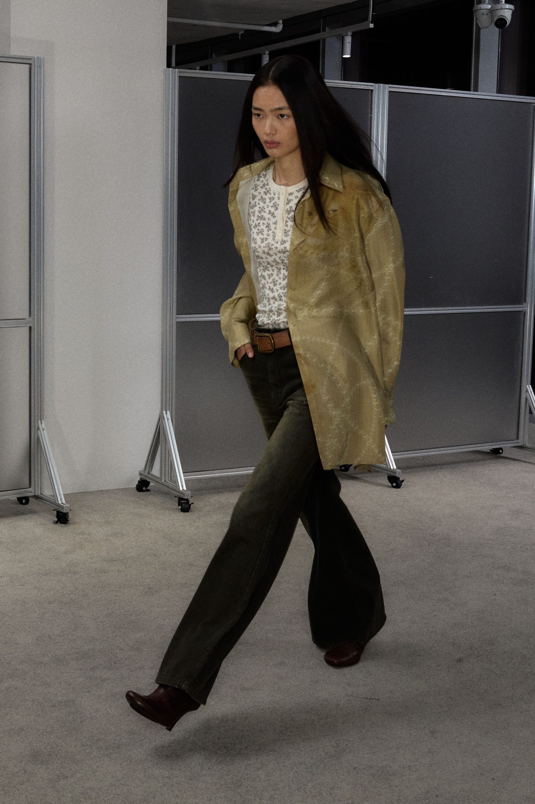 beige silk shirt with green pants