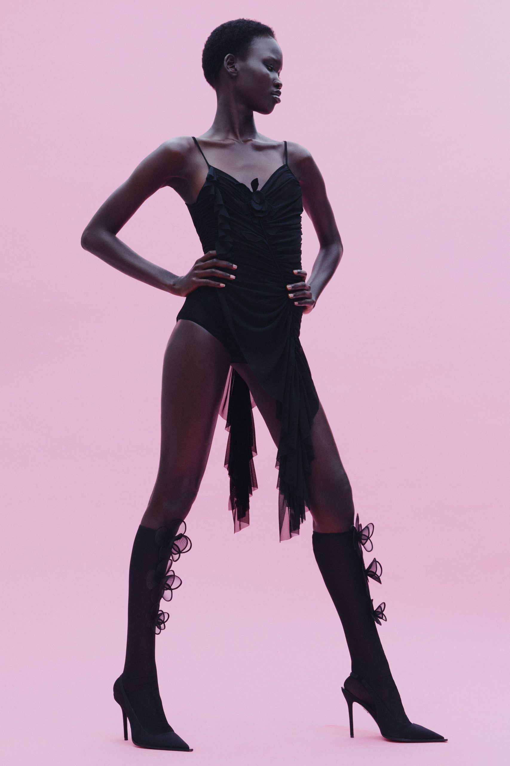 black silk sleeveless v-neck fitted ruched draped bodysuit