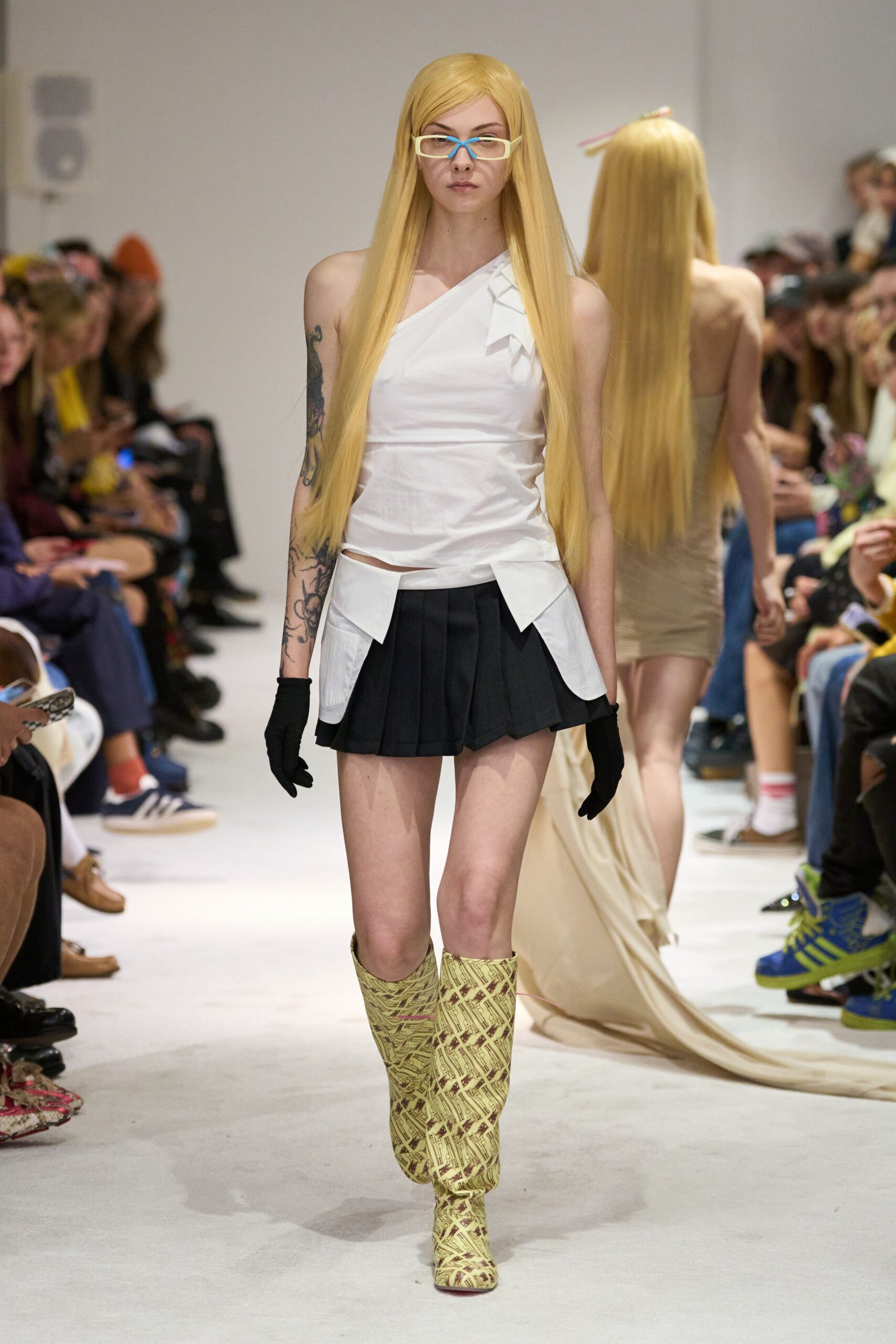 white asymmetric top with black skirt