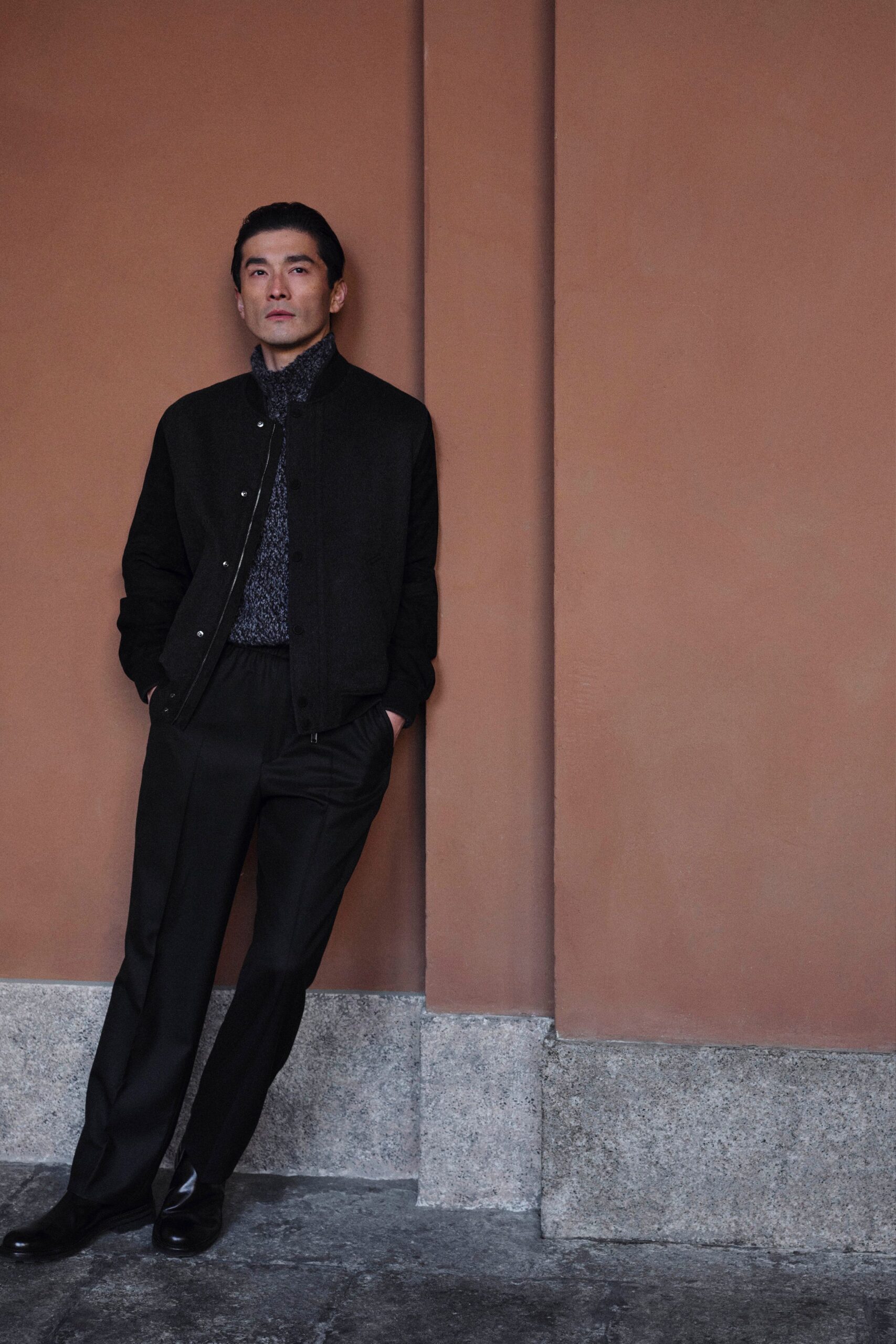 black jacket blue shirt tailored pants