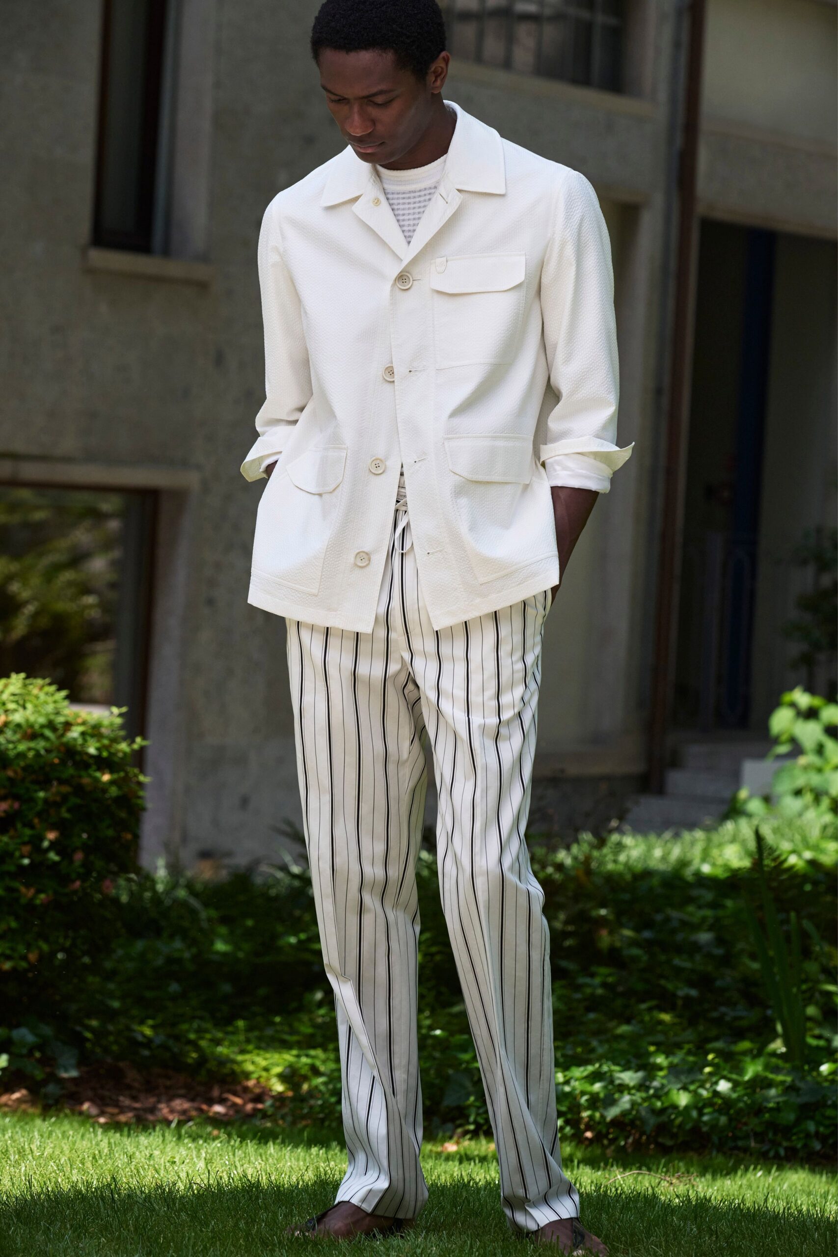white cotton jacket with striped pants
