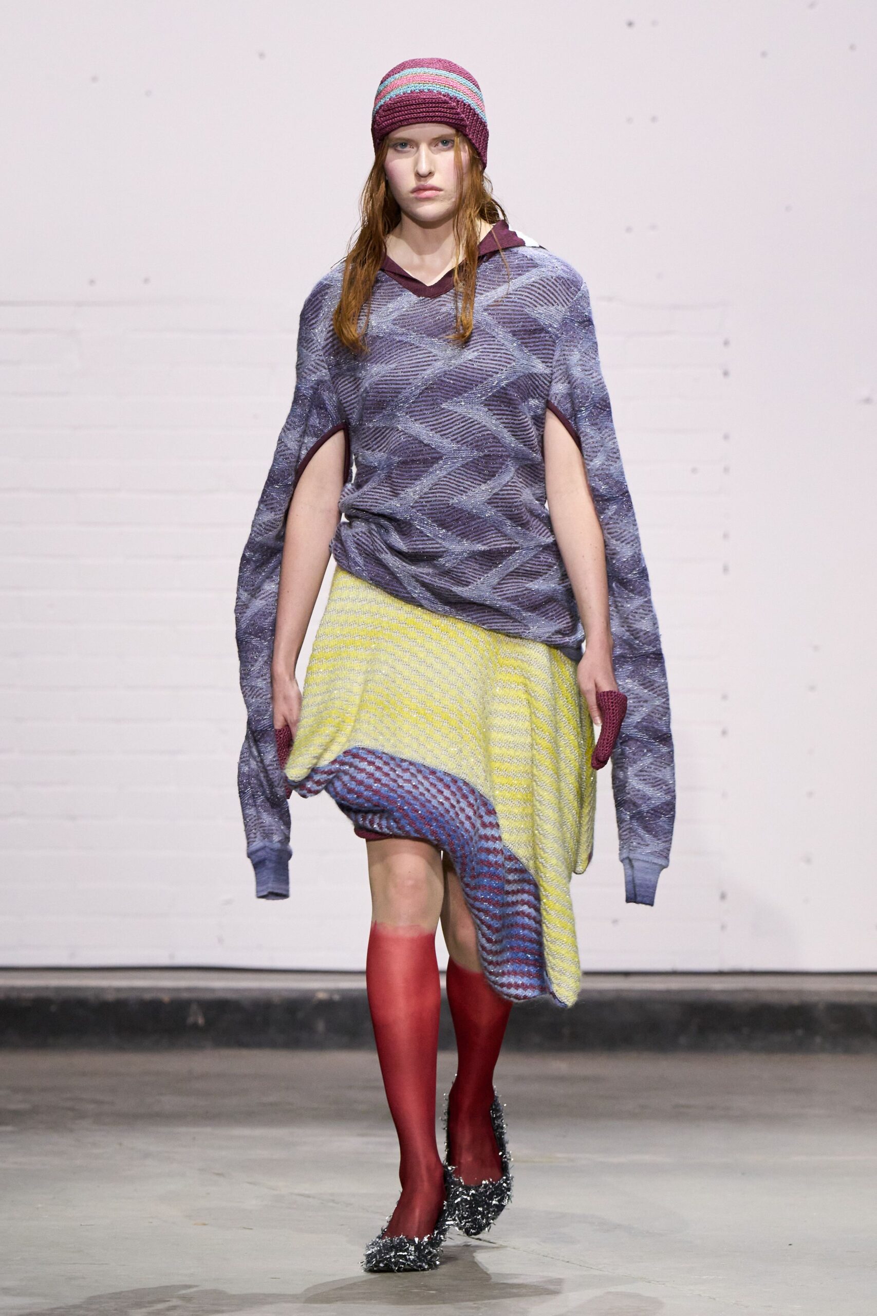 purple relaxed sweater with asymmetric skirt