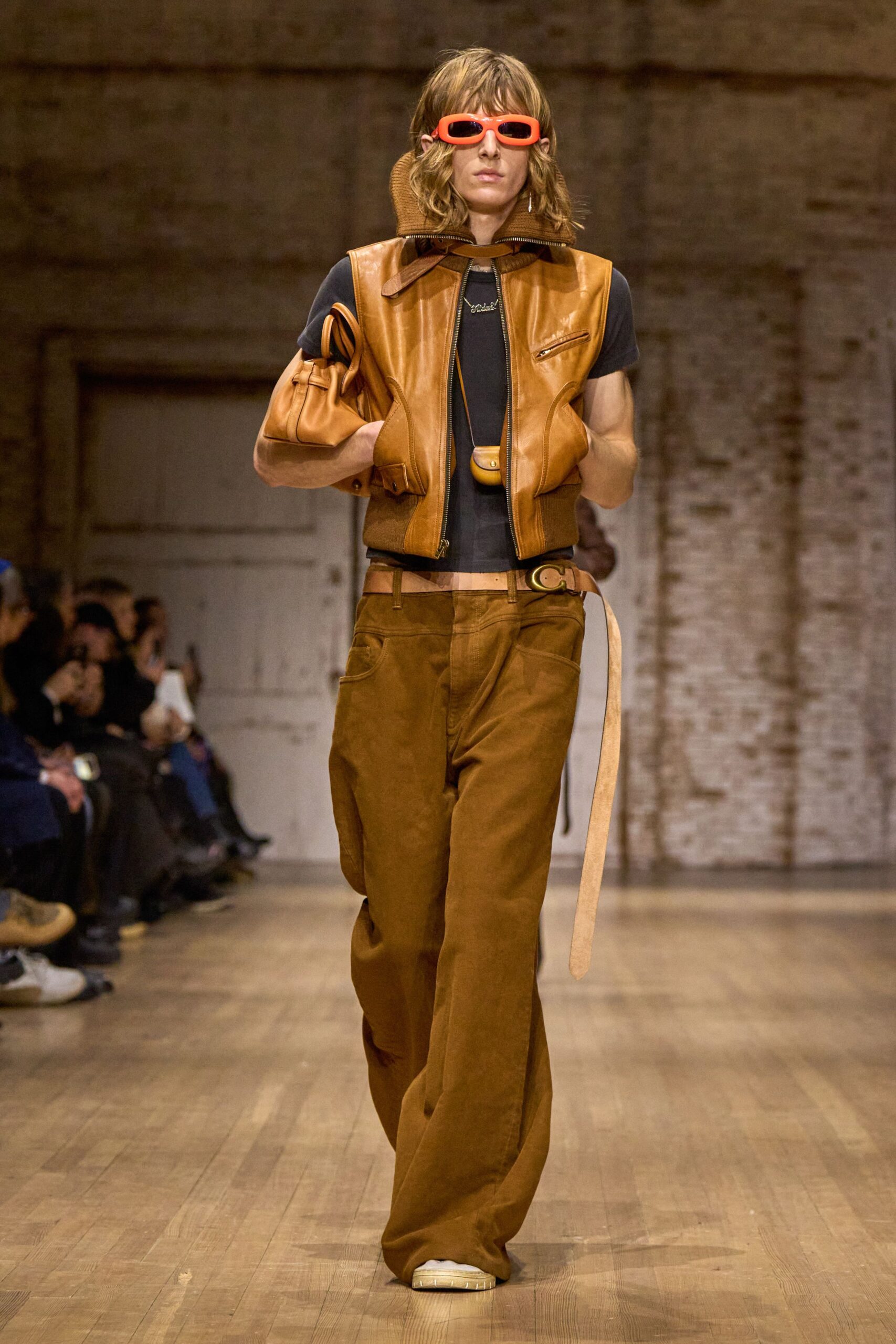 brown leather jacket with black t-shirt