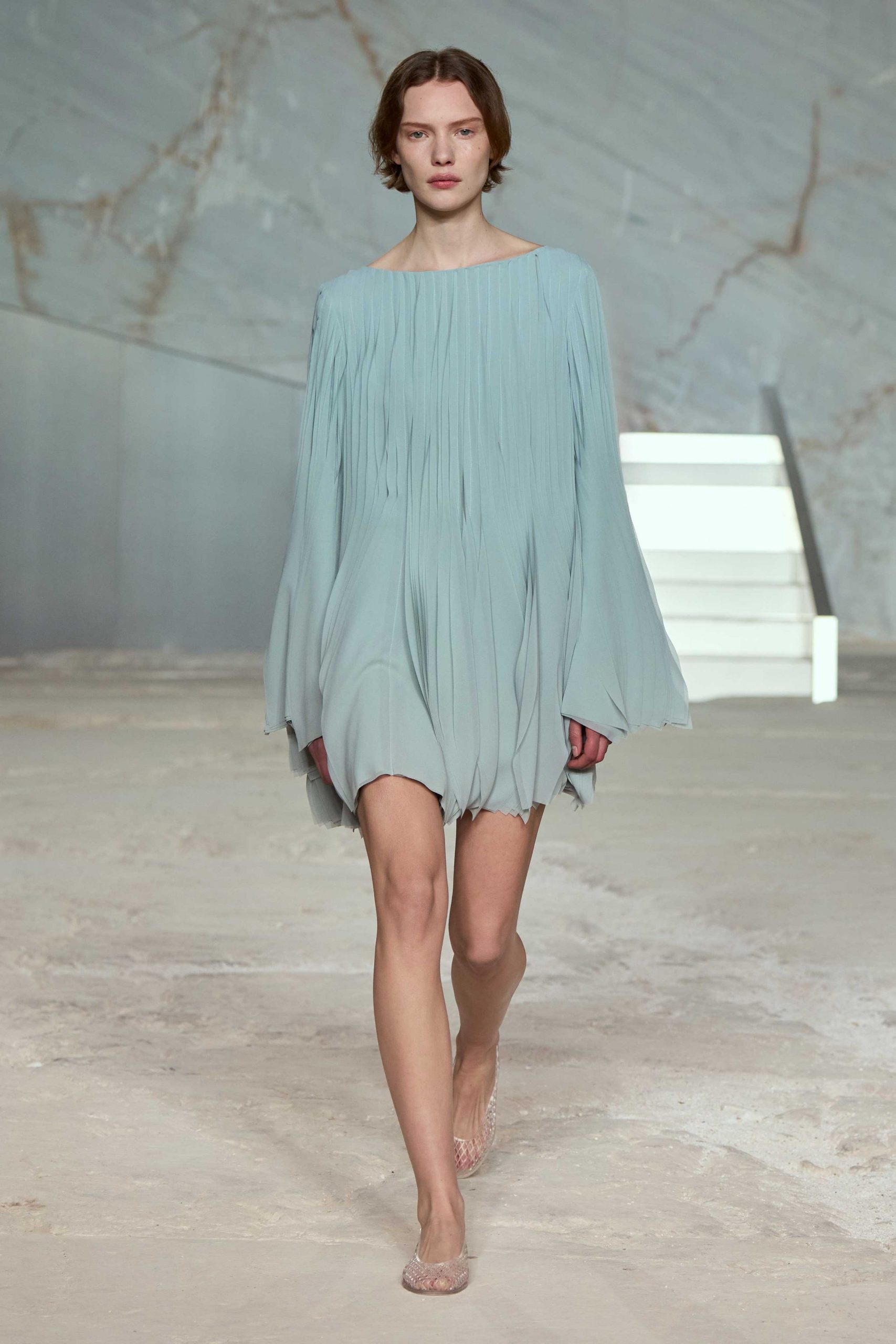 blue silk long-sleeve off-shoulder relaxed pleated flowing dress
